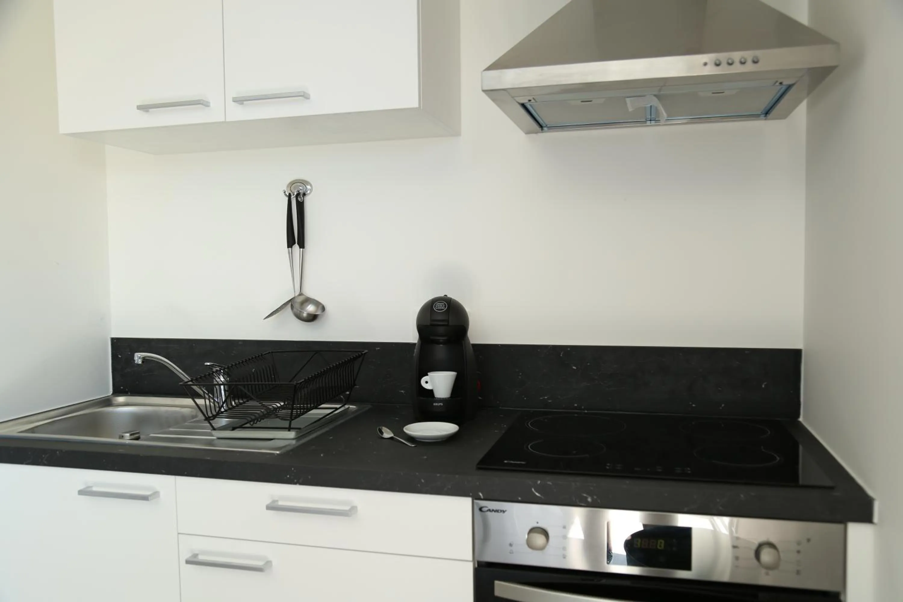 Kitchen or kitchenette in Résidence Moderne