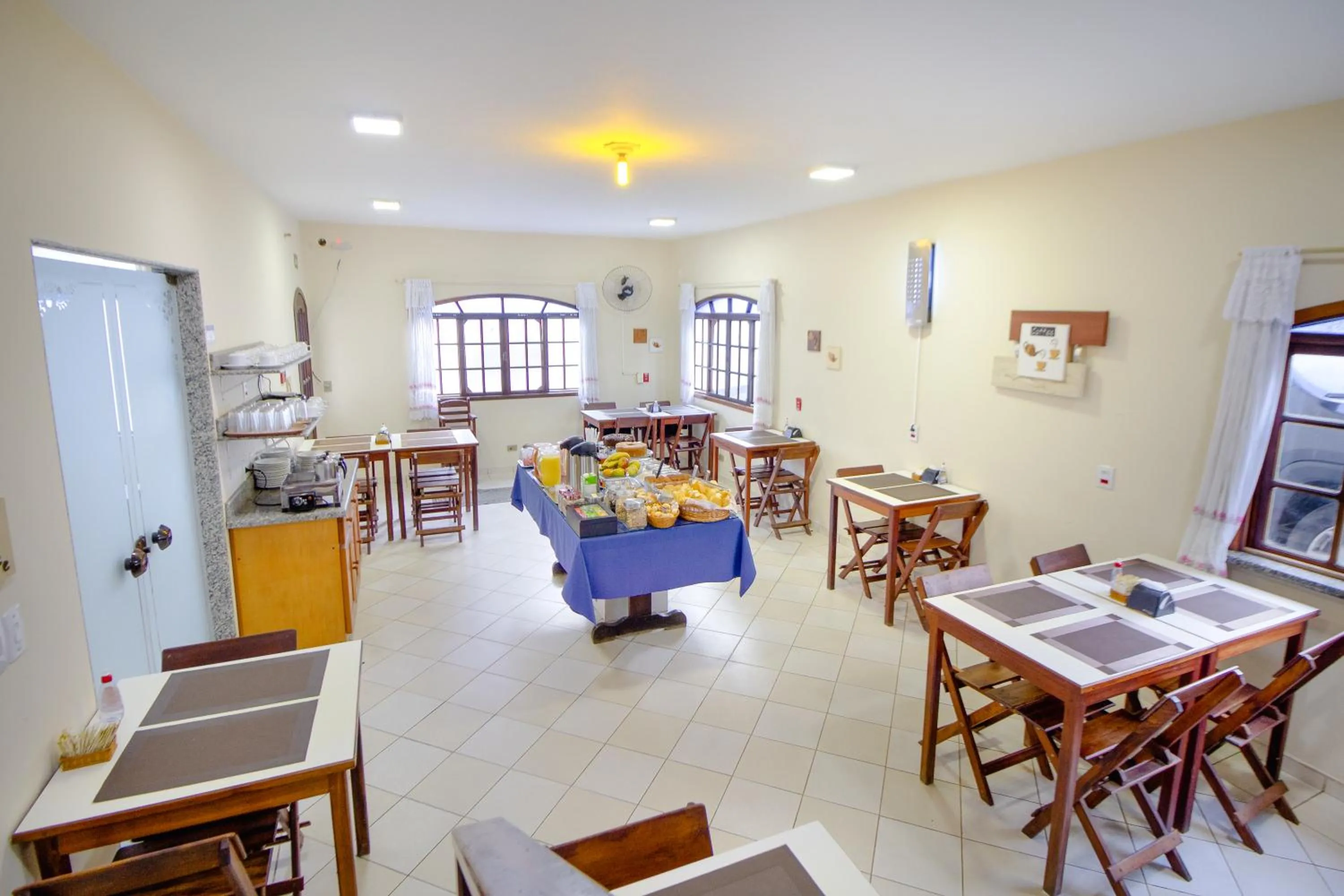 Kitchen or kitchenette in VELINN Pousada Mirante da Praia Grande