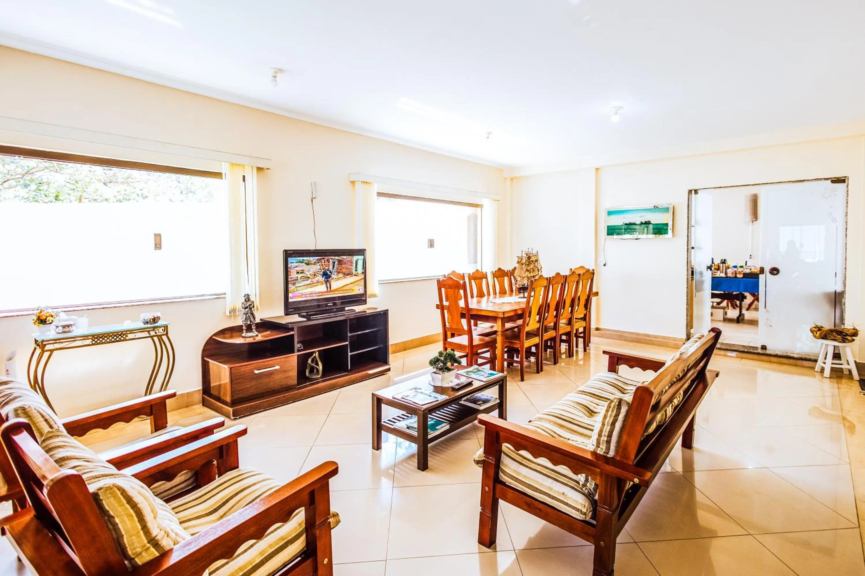 Communal lounge/ TV room in VELINN Pousada Mirante da Praia Grande