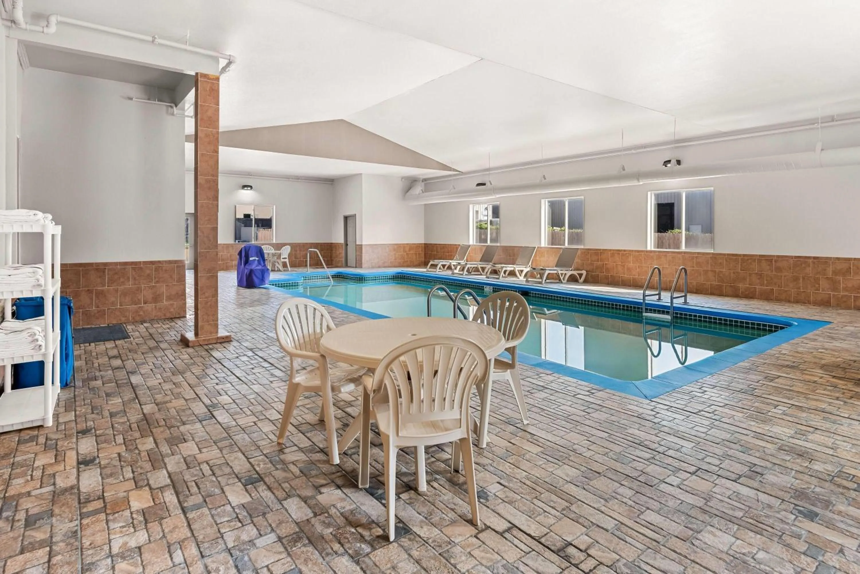 Swimming pool in Days Inn & Suites by Wyndham Cedar Rapids