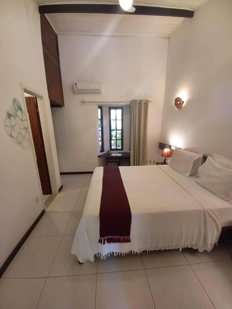 Bed in Pousada Jambo