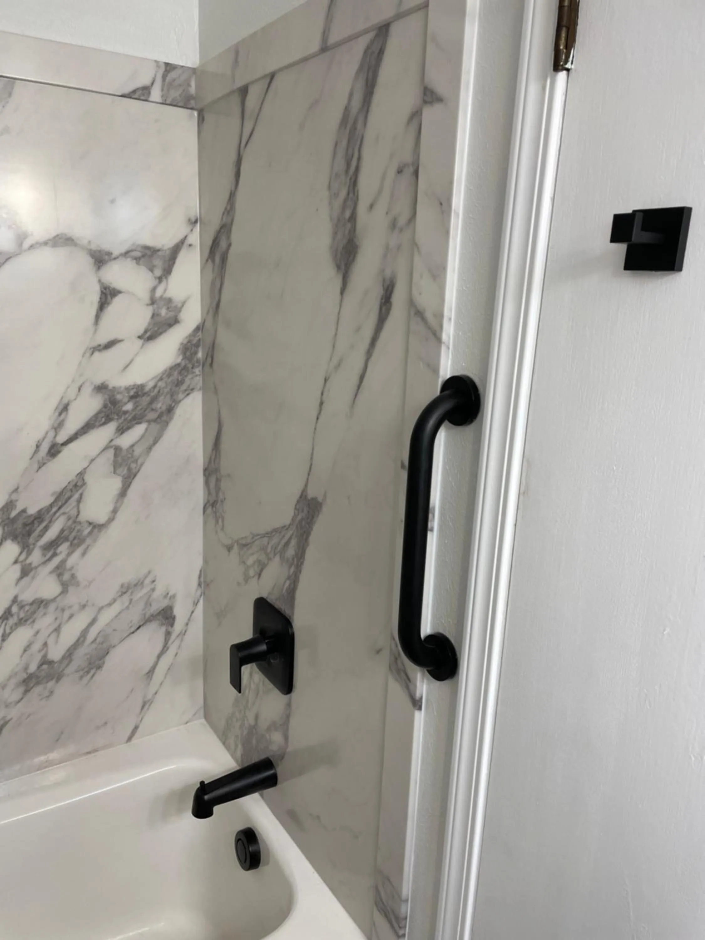 Shower in Americas Best Value Inn Polson