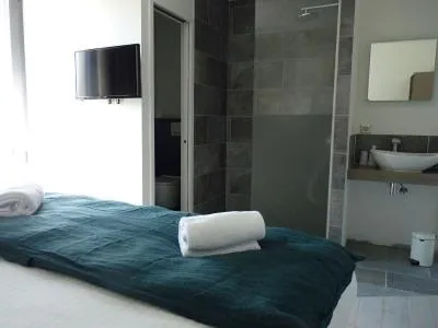 Bathroom, Bed in Pavillon de la plage