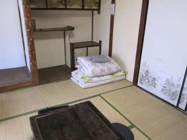 Photo of the whole room, Bed in Taito Ryokan