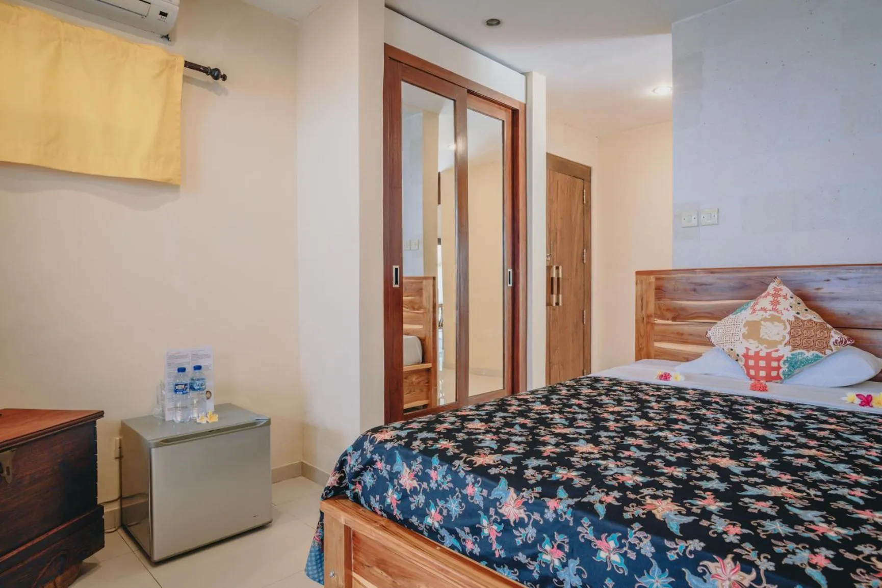 Bed in Frangipani Beach Hotel