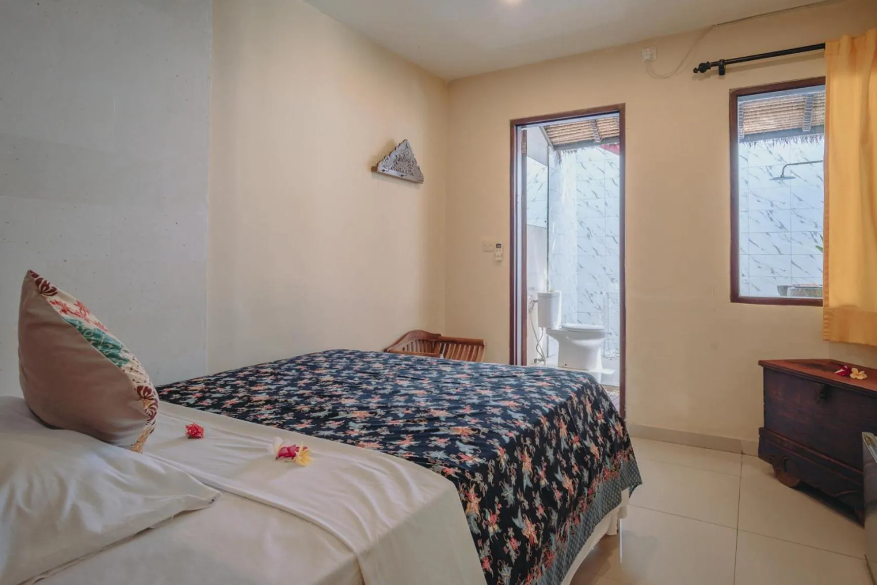 Bed in Frangipani Beach Hotel