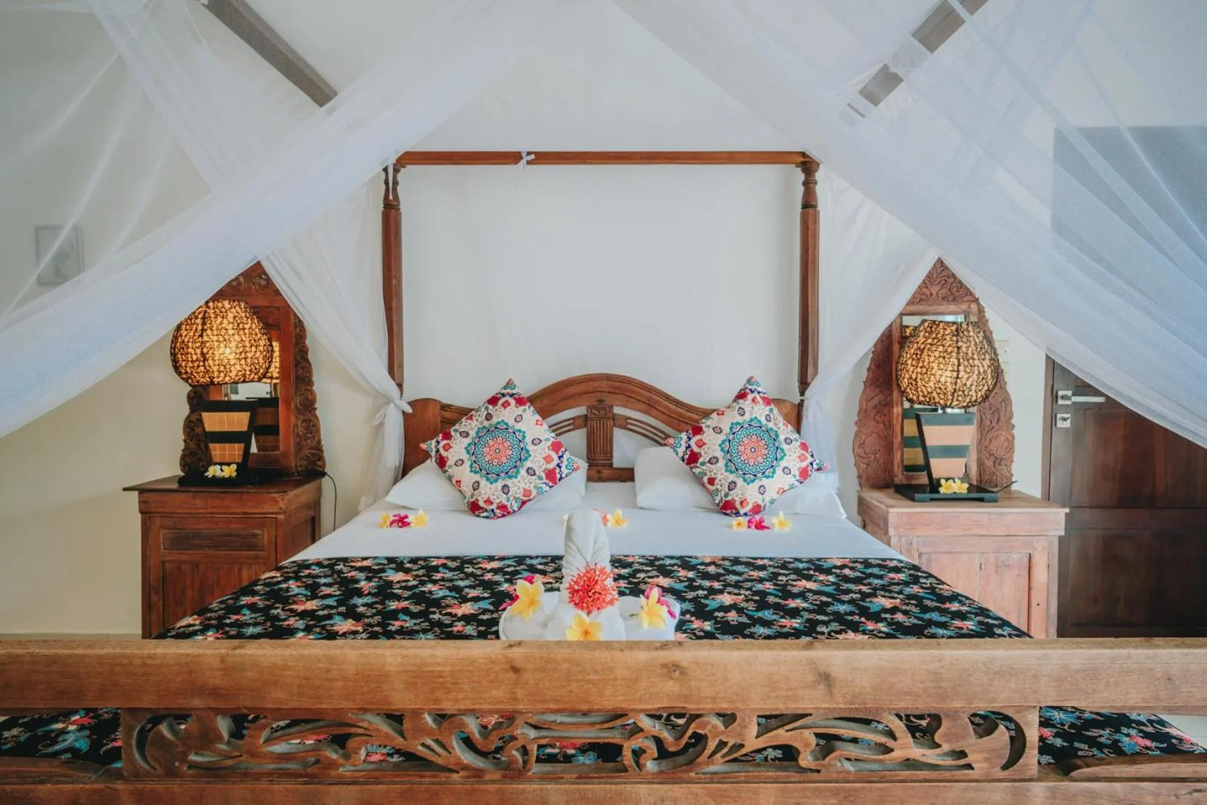 Bed in Frangipani Beach Hotel