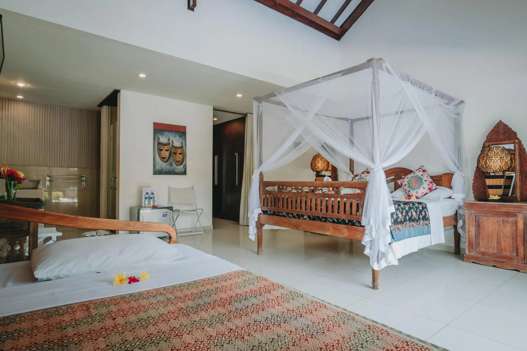 Bed in Frangipani Beach Hotel