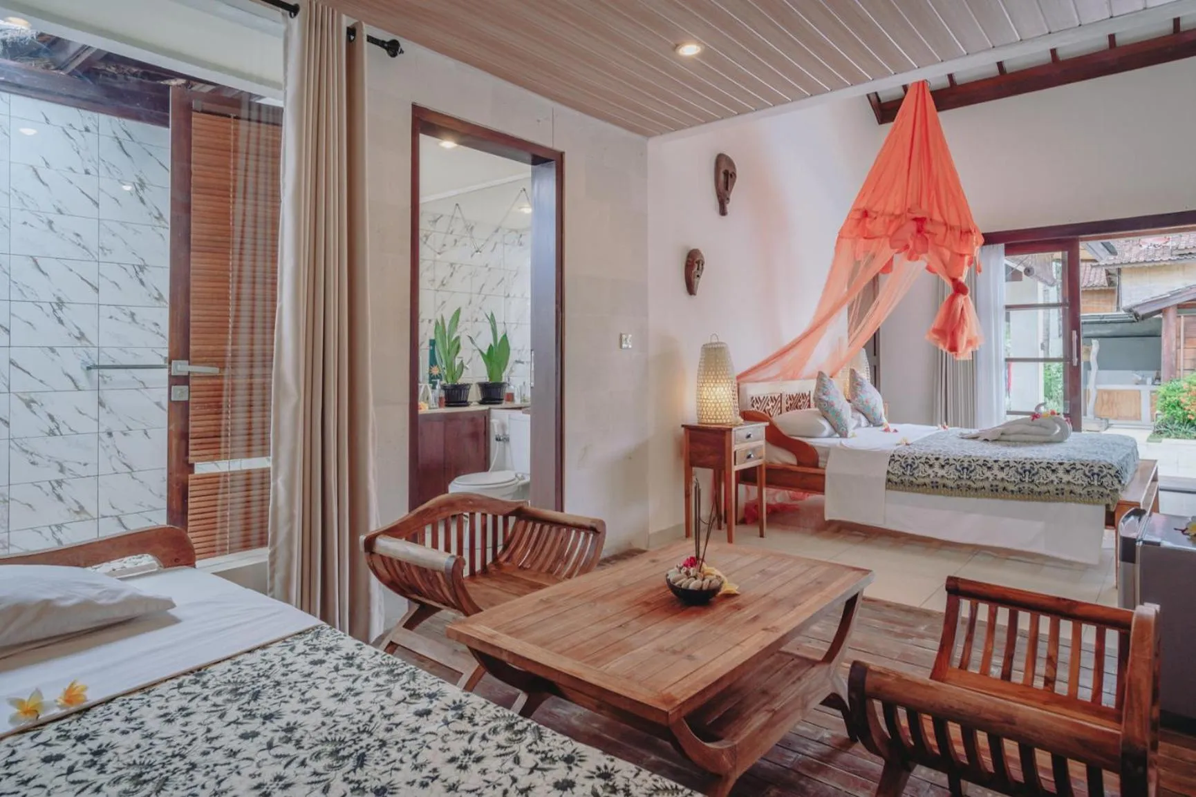 Bed in Frangipani Beach Hotel