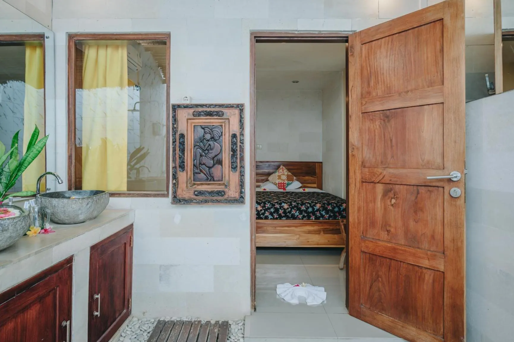 Bed in Frangipani Beach Hotel