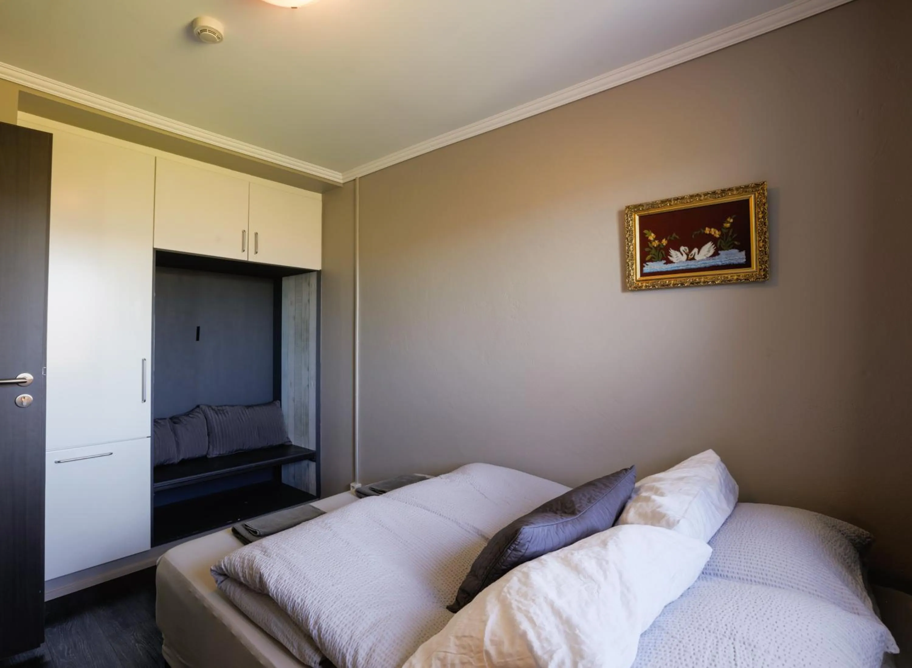 Bed in Karuna Guesthouse