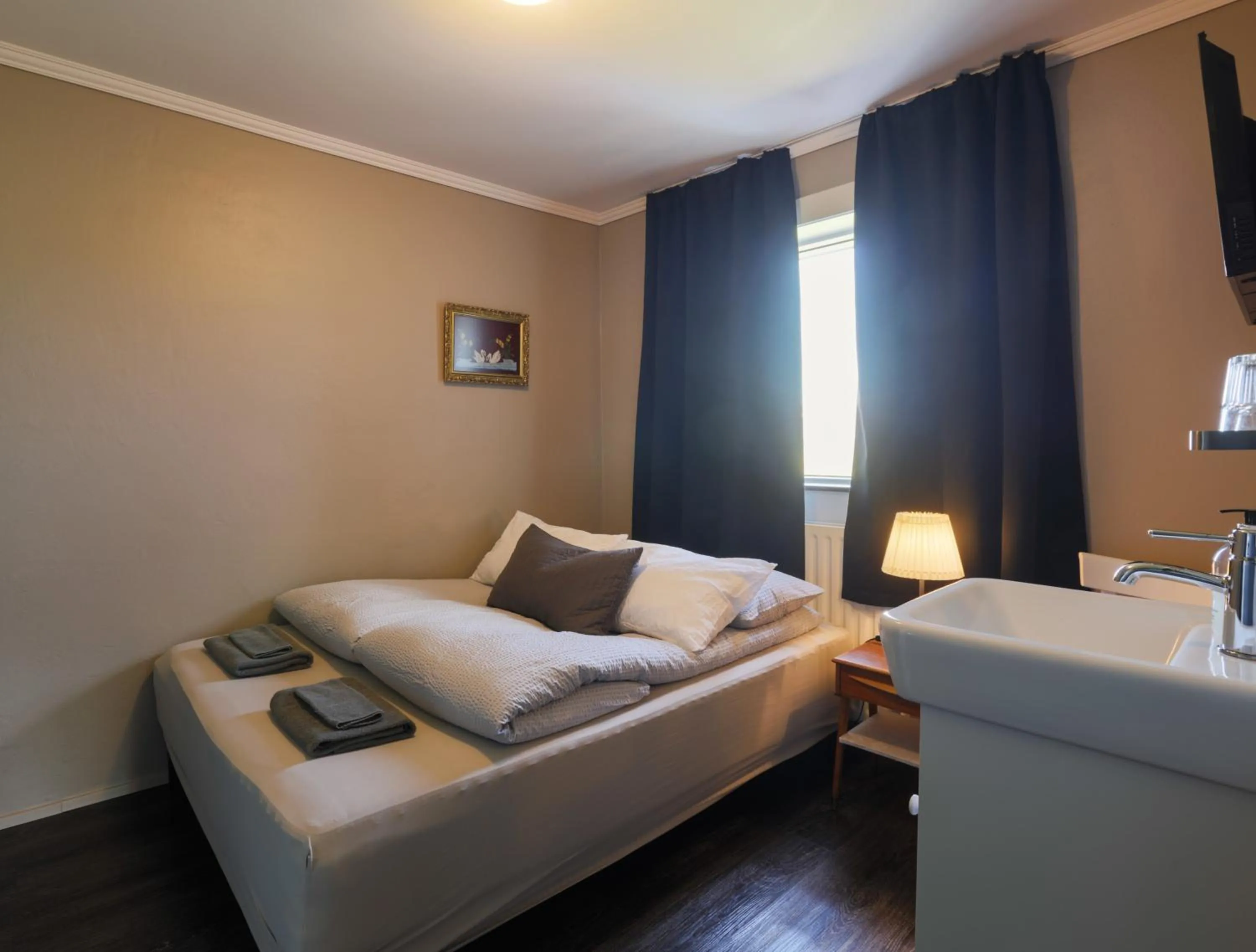 Bed in Karuna Guesthouse