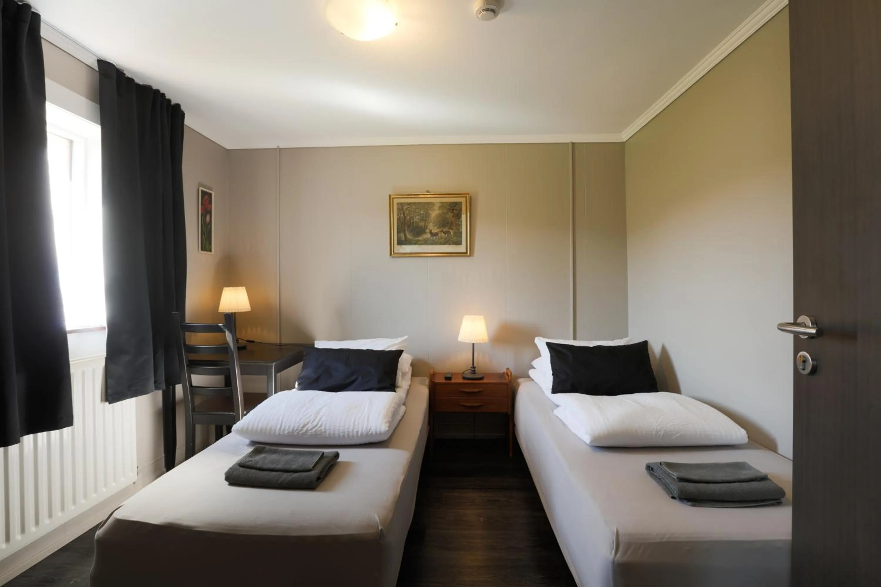 Bed in Karuna Guesthouse