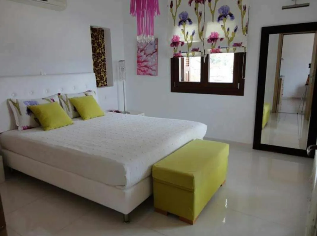 Bed in Skiathos Garden Cottages