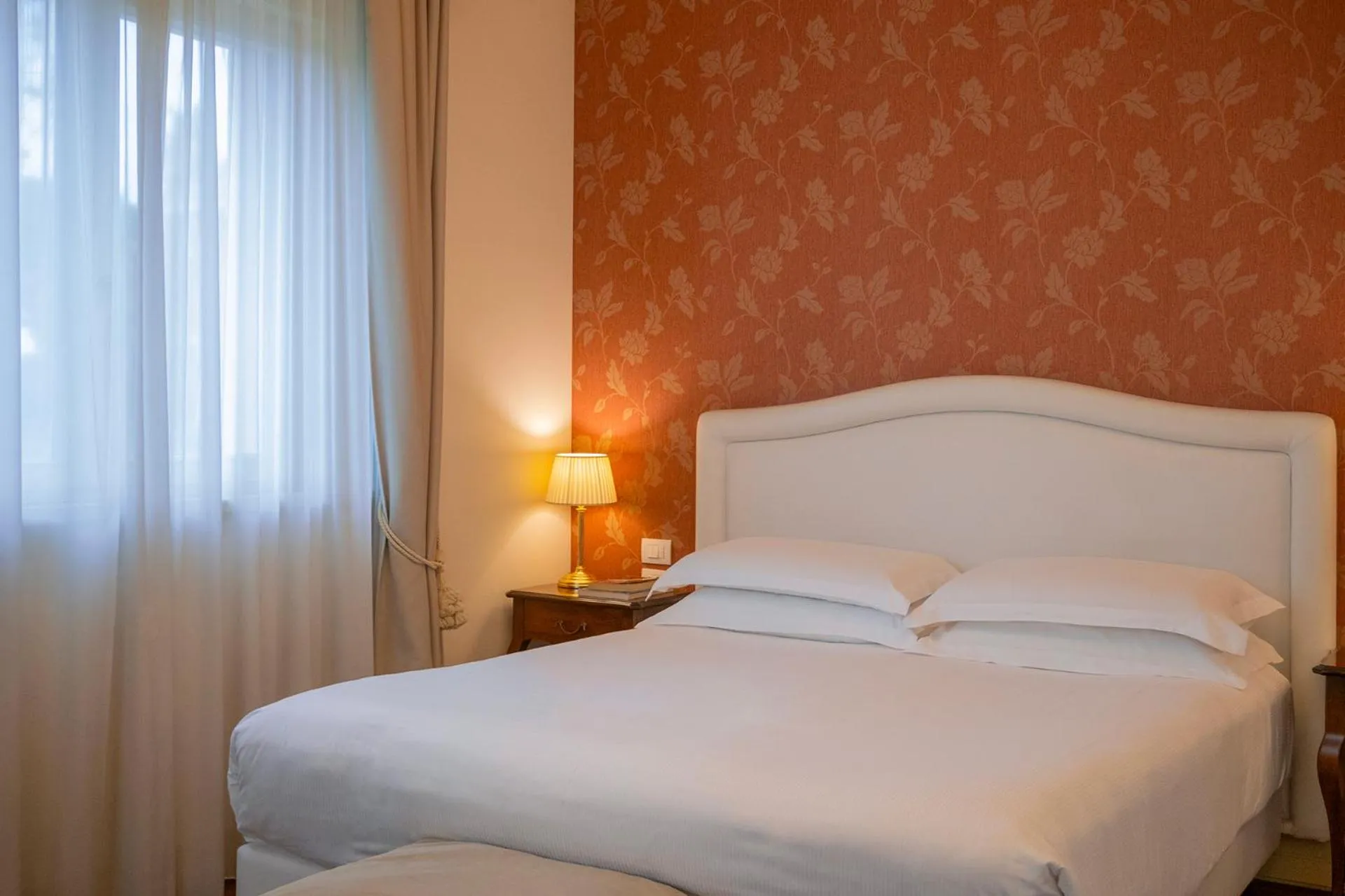 Bed in Hotel Villa Michelangelo