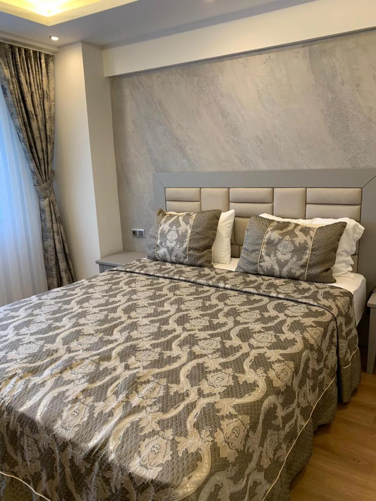 Bed in Regency World Hotel