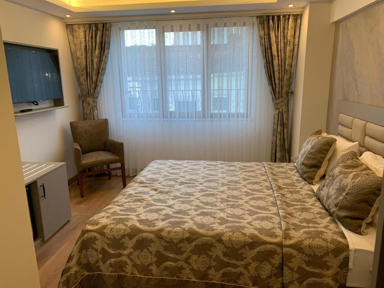 Bed in Regency World Hotel