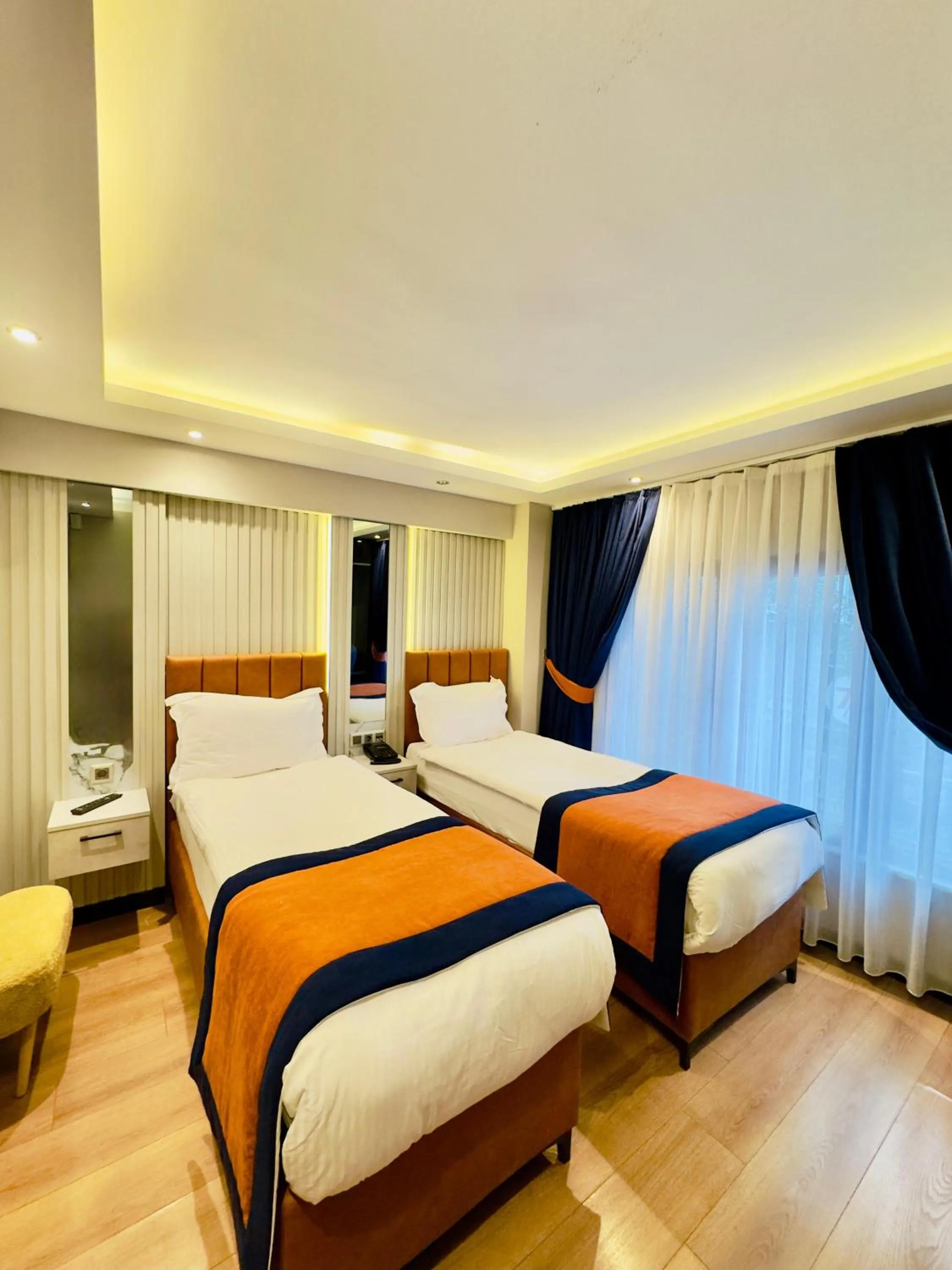 Bed in Regency World Hotel