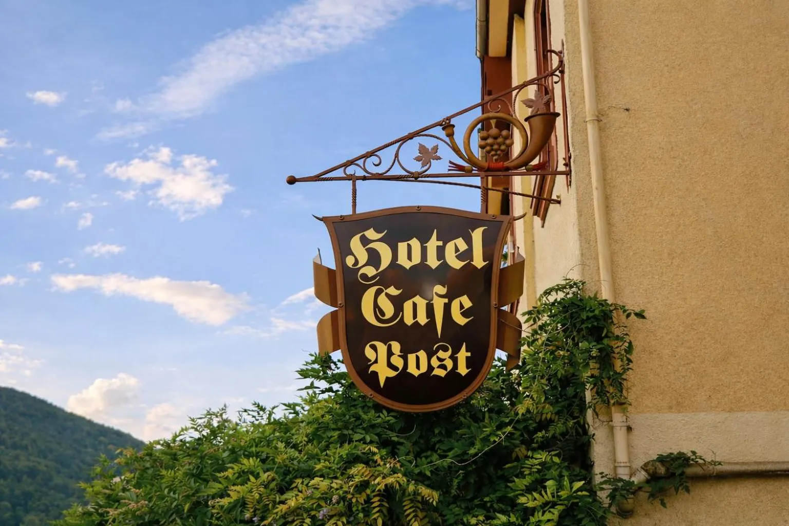 Property logo or sign in Hotel Café Post