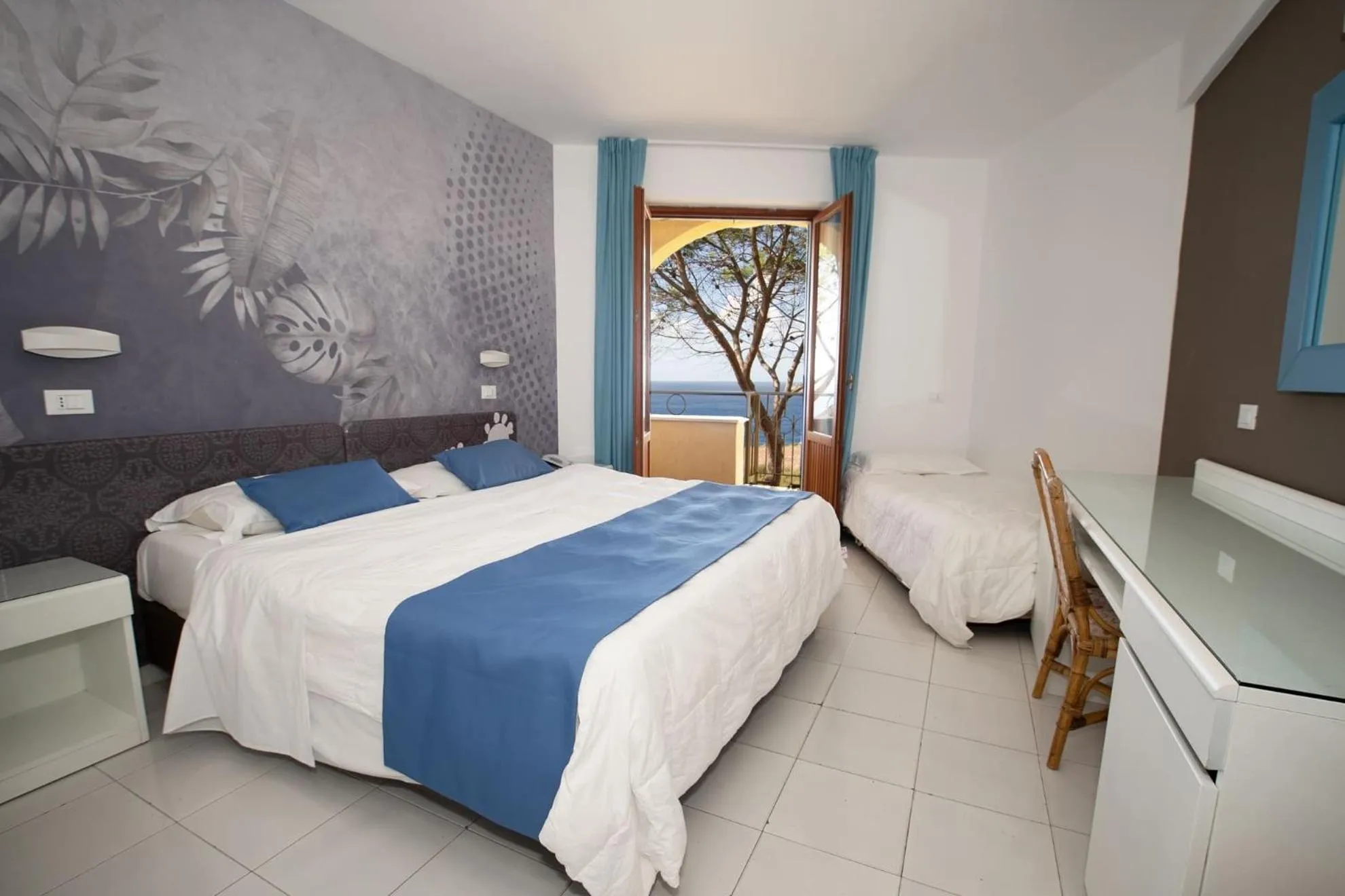 Bed in Perla Del Golfo Resort