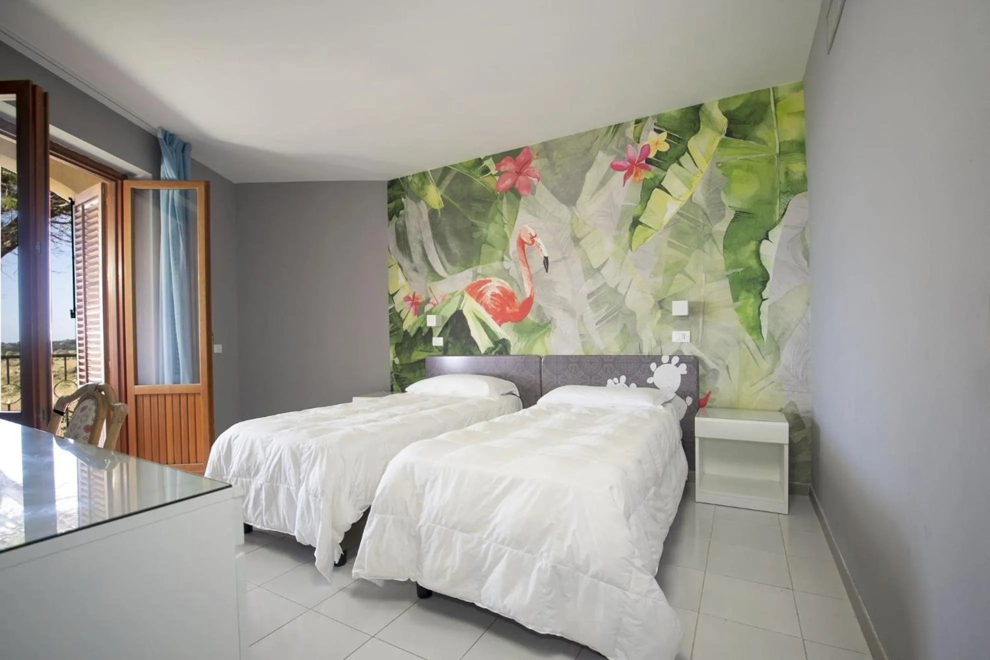 Bed in Perla Del Golfo Resort