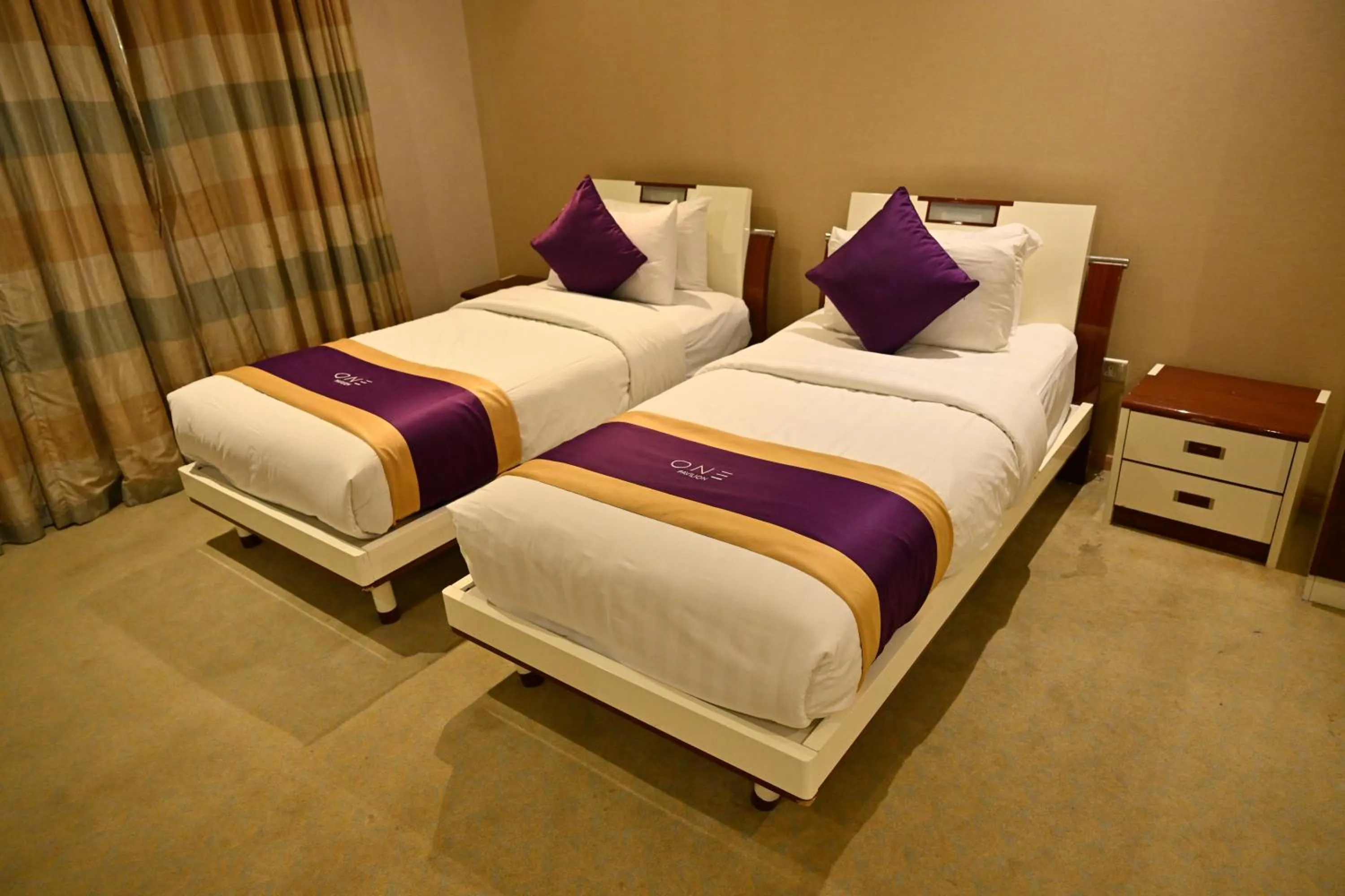 Bed in One Pavilion Luxury Serviced Apartments