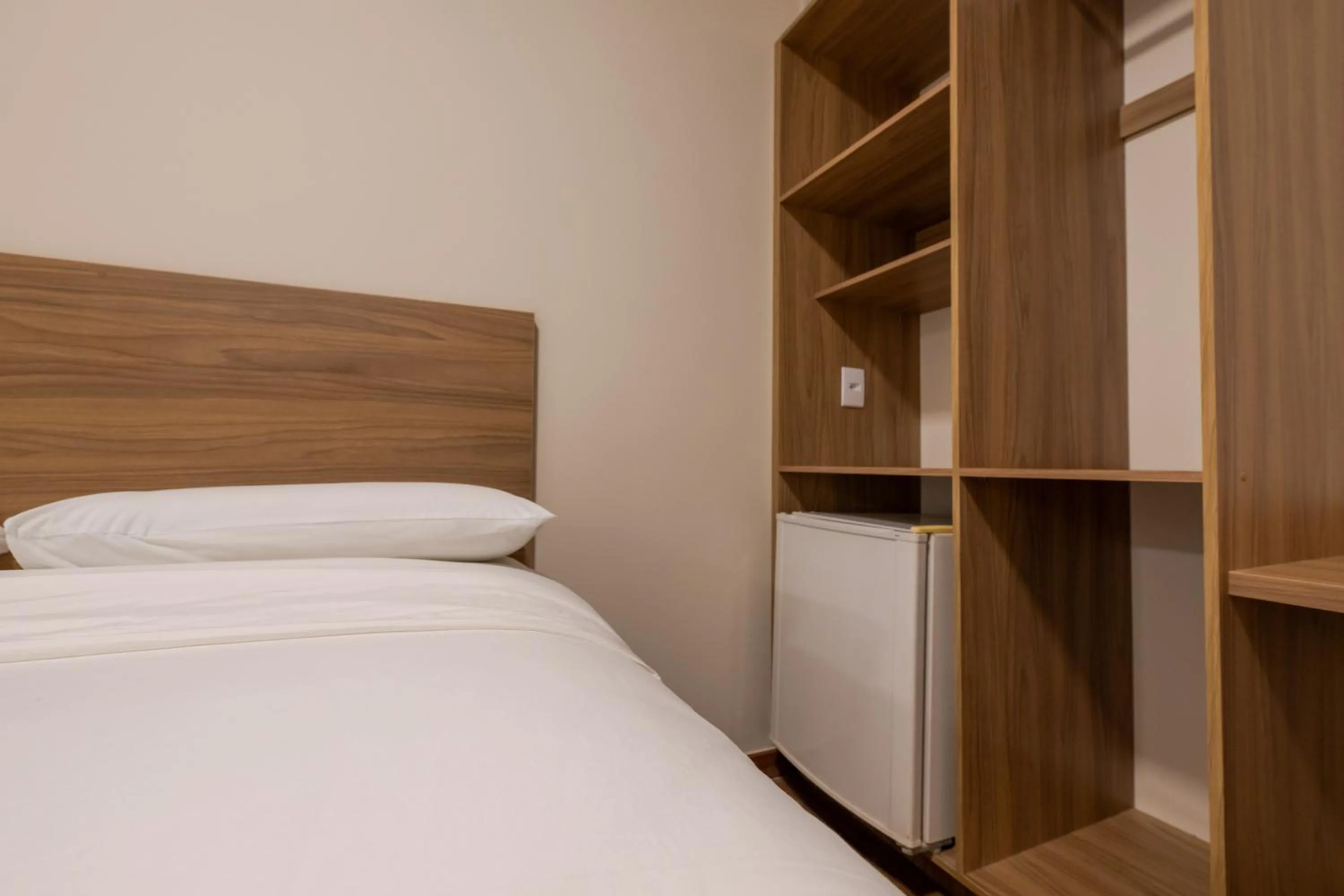 Bed in Vektor Hotéis - Unidade Mariana