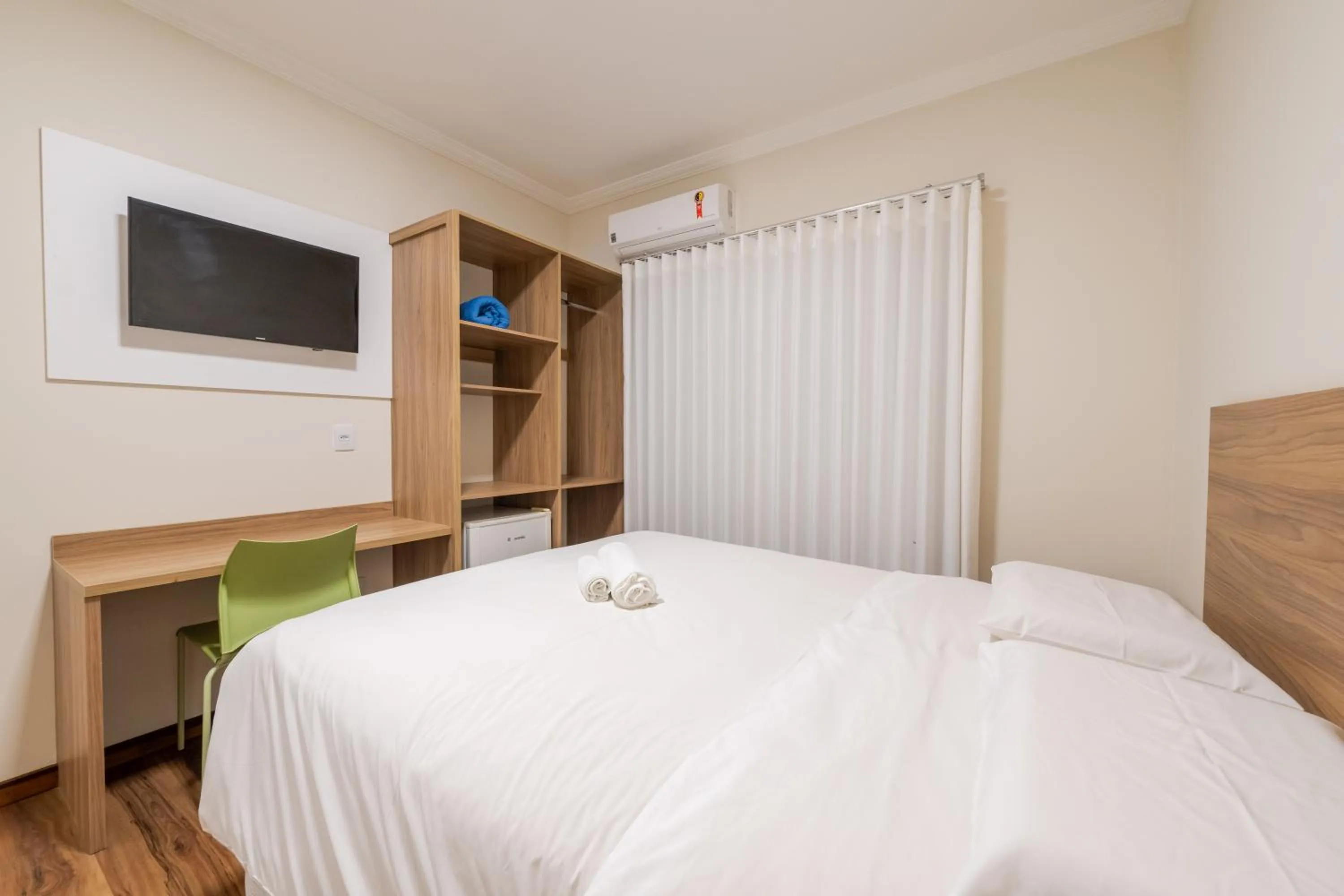 Bed in Vektor Hotéis - Unidade Mariana