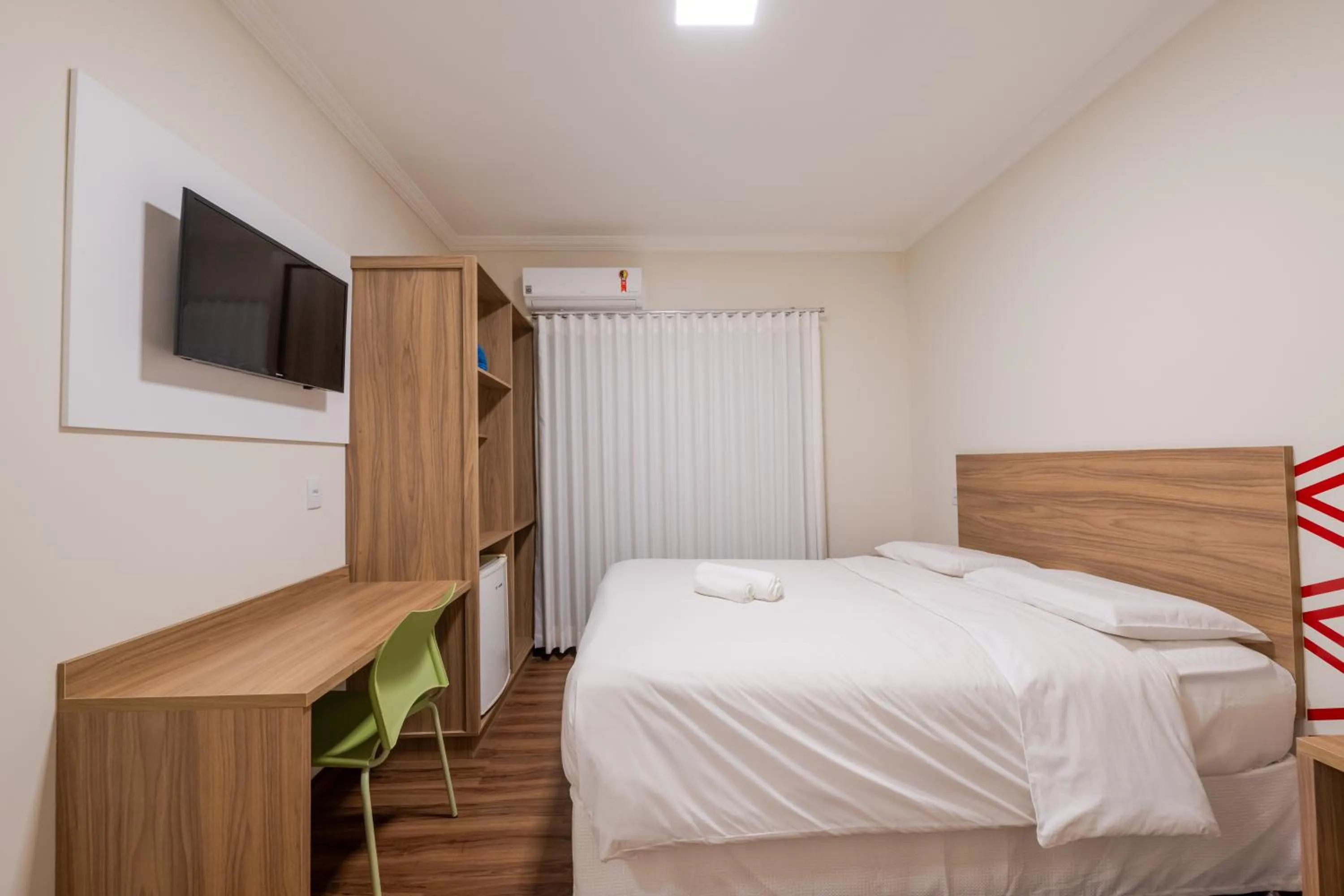 Bed in Vektor Hotéis - Unidade Mariana