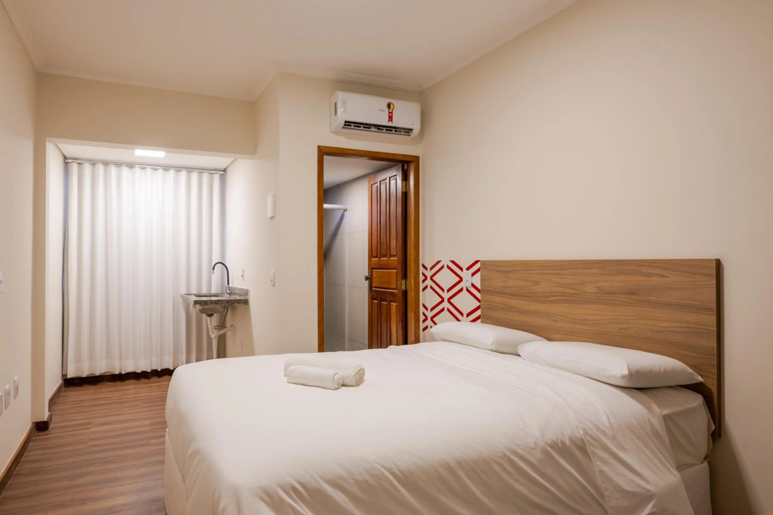 Bed in Vektor Hotéis - Unidade Mariana