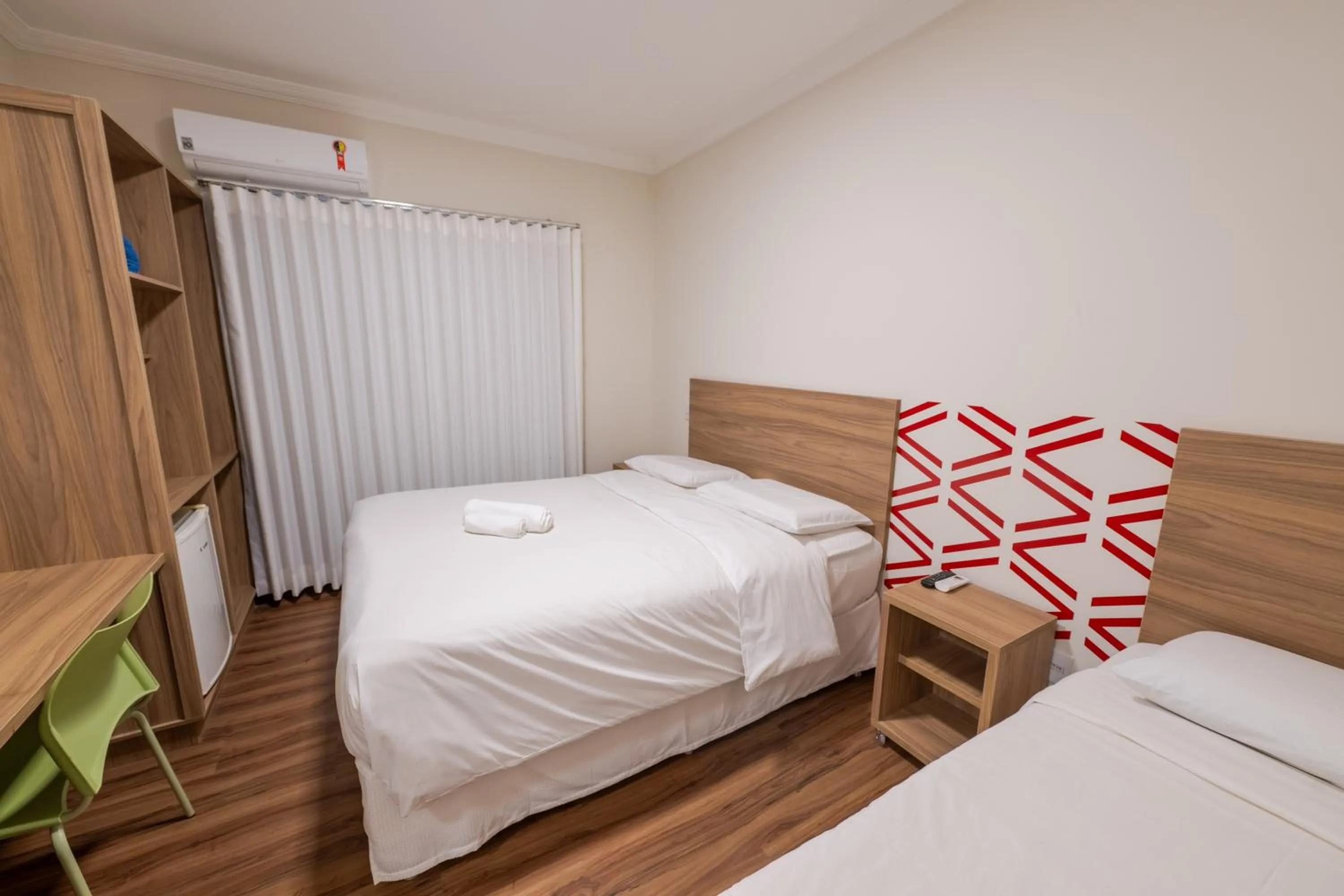 Bed in Vektor Hotéis - Unidade Mariana