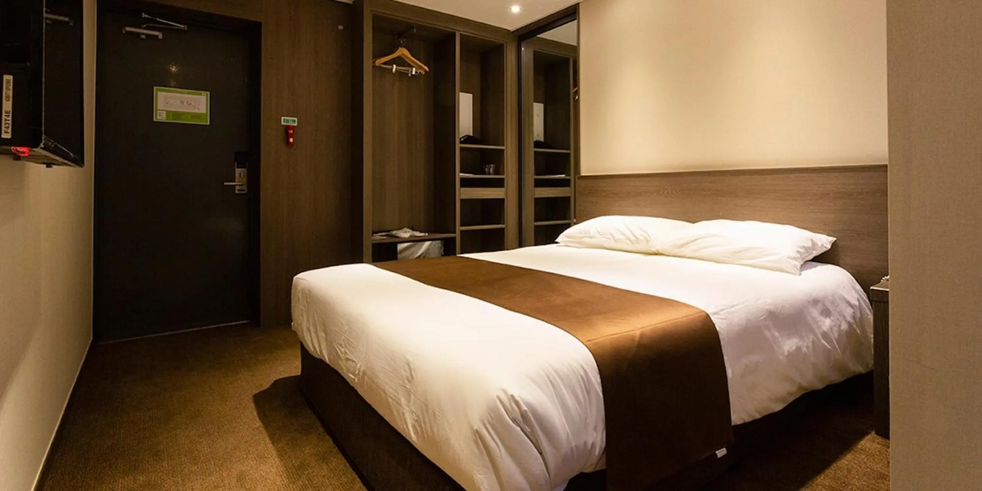 Bed in Grandmillions Hotel Seogwipo