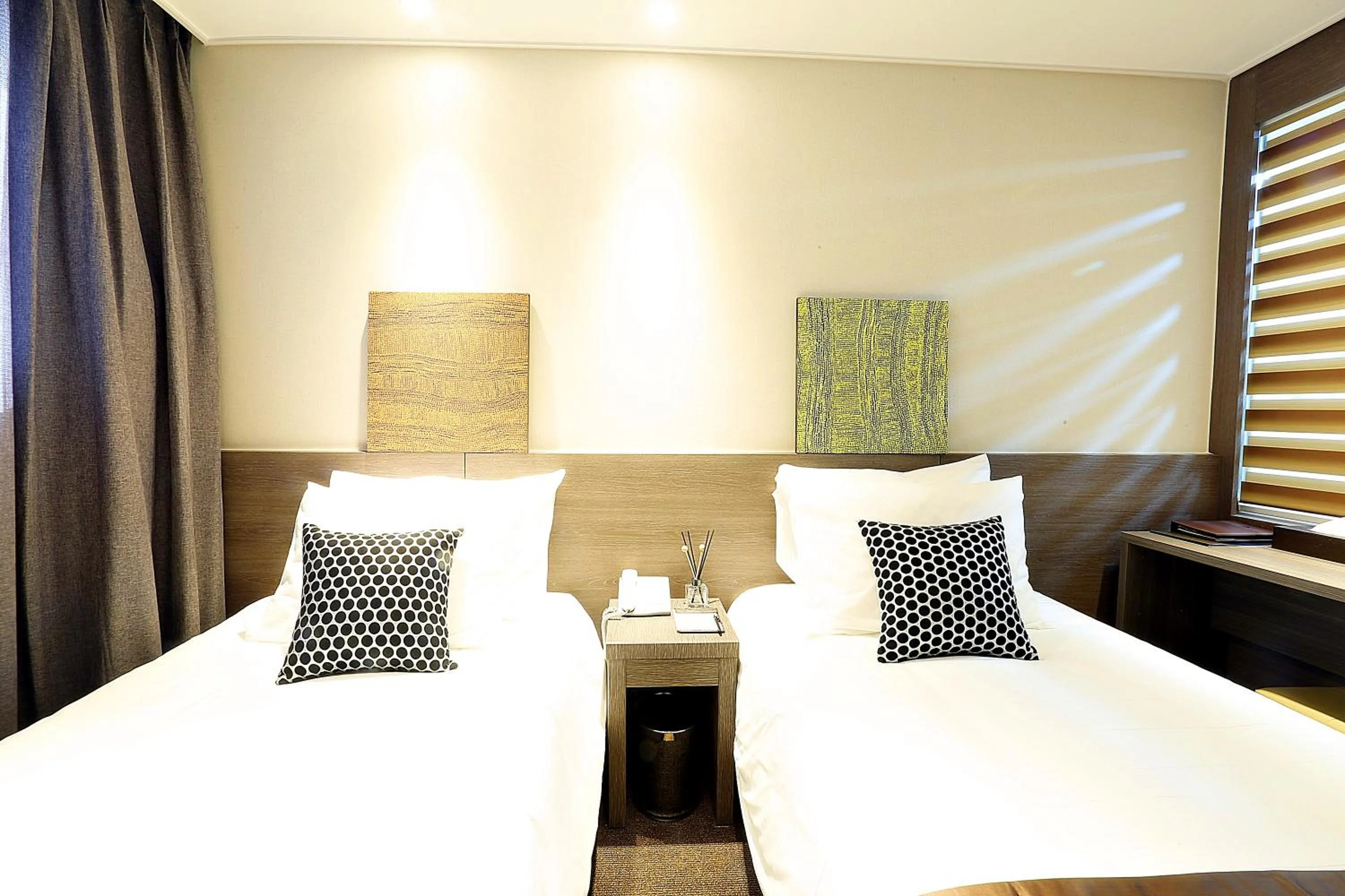 Photo of the whole room, Bed in Grandmillions Hotel Seogwipo