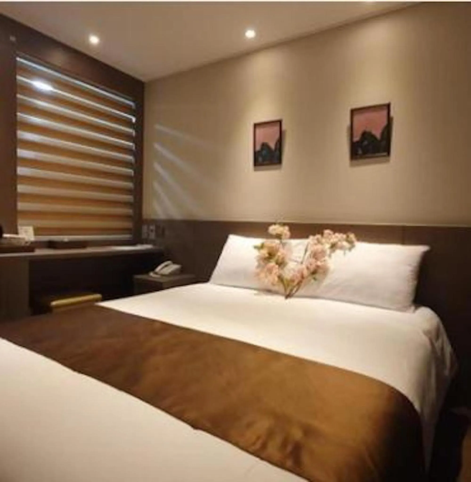 Bed in Grandmillions Hotel Seogwipo