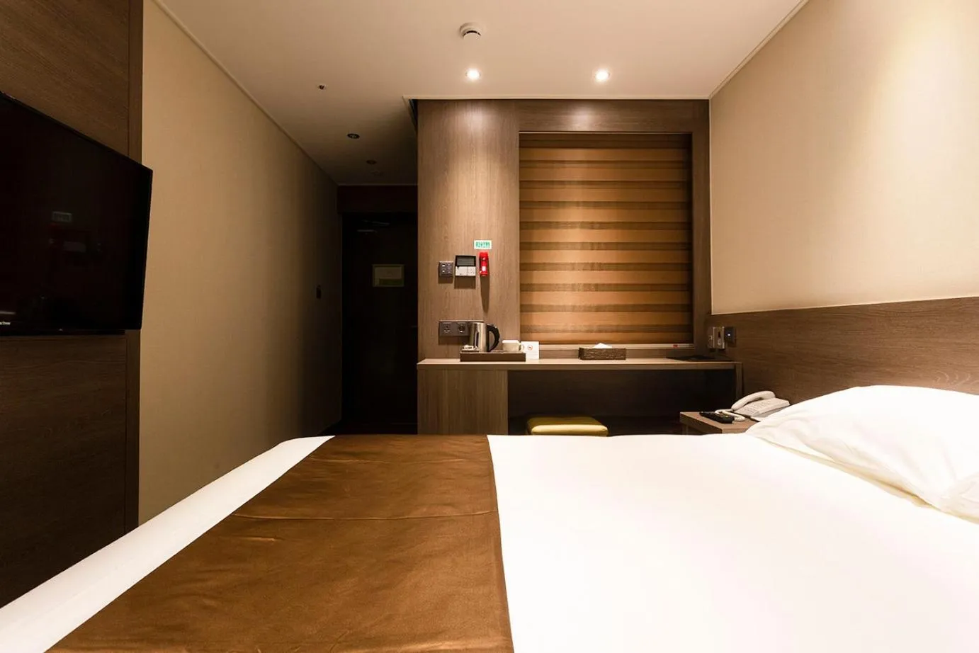 Photo of the whole room, Bed in Grandmillions Hotel Seogwipo