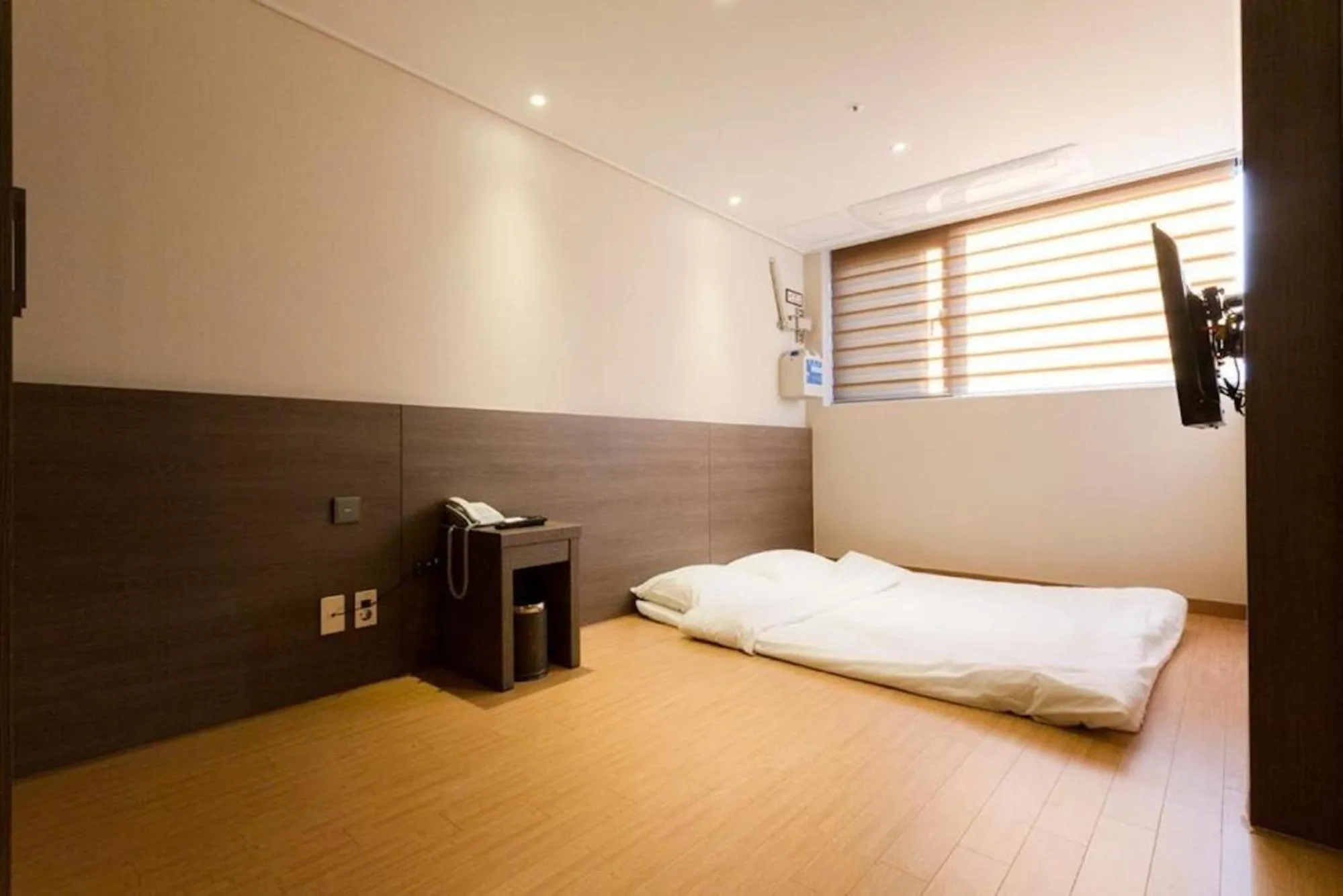 Bed in Grandmillions Hotel Seogwipo