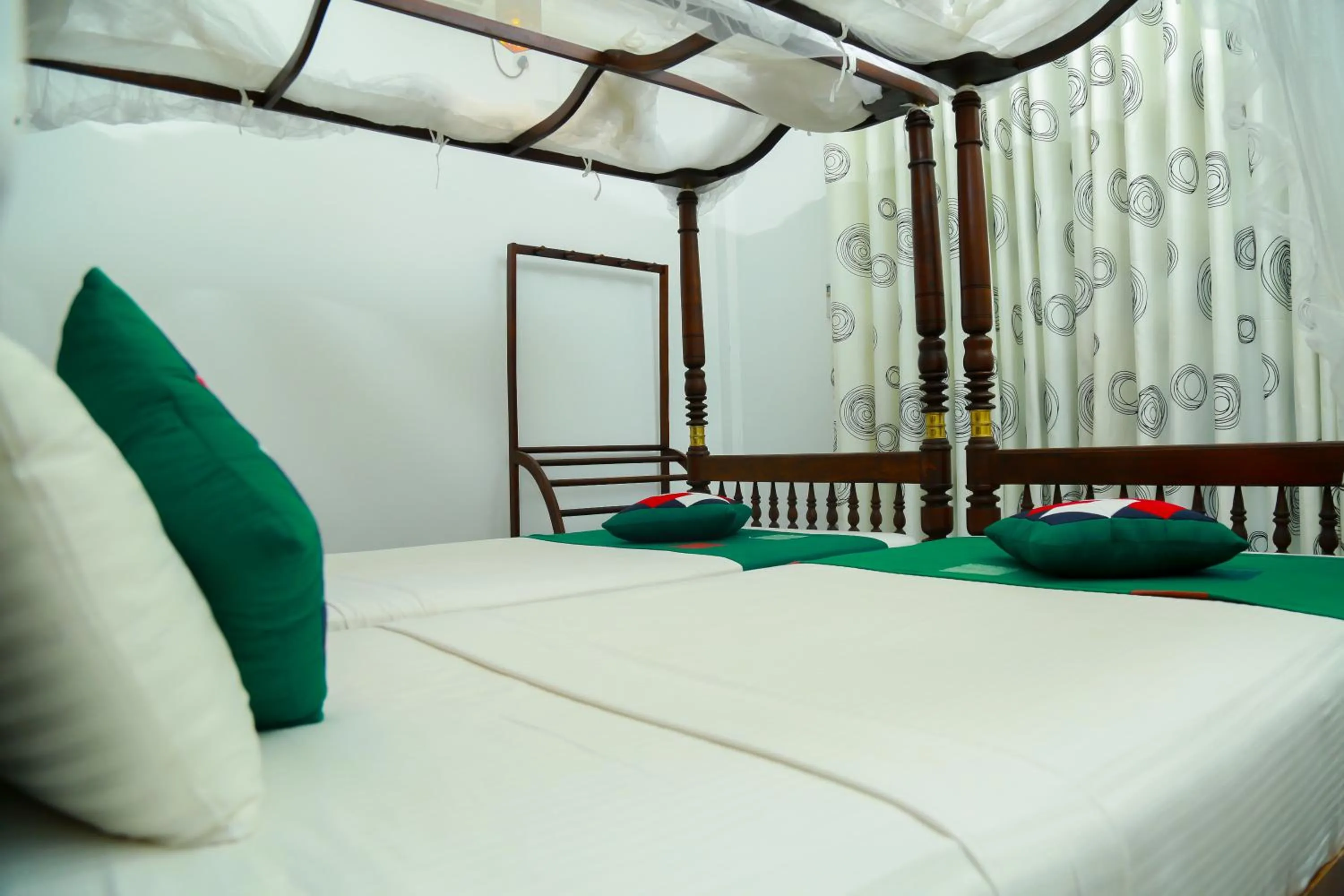 Bed in Goyambokka Guesthouse