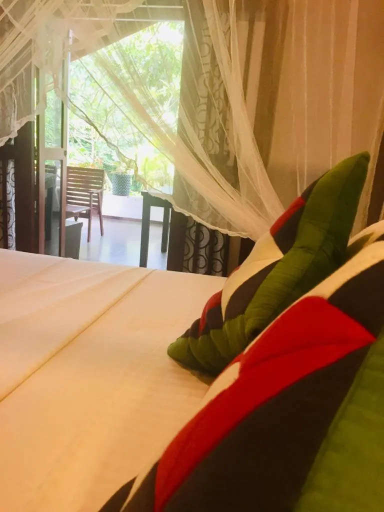 Bed in Goyambokka Guesthouse