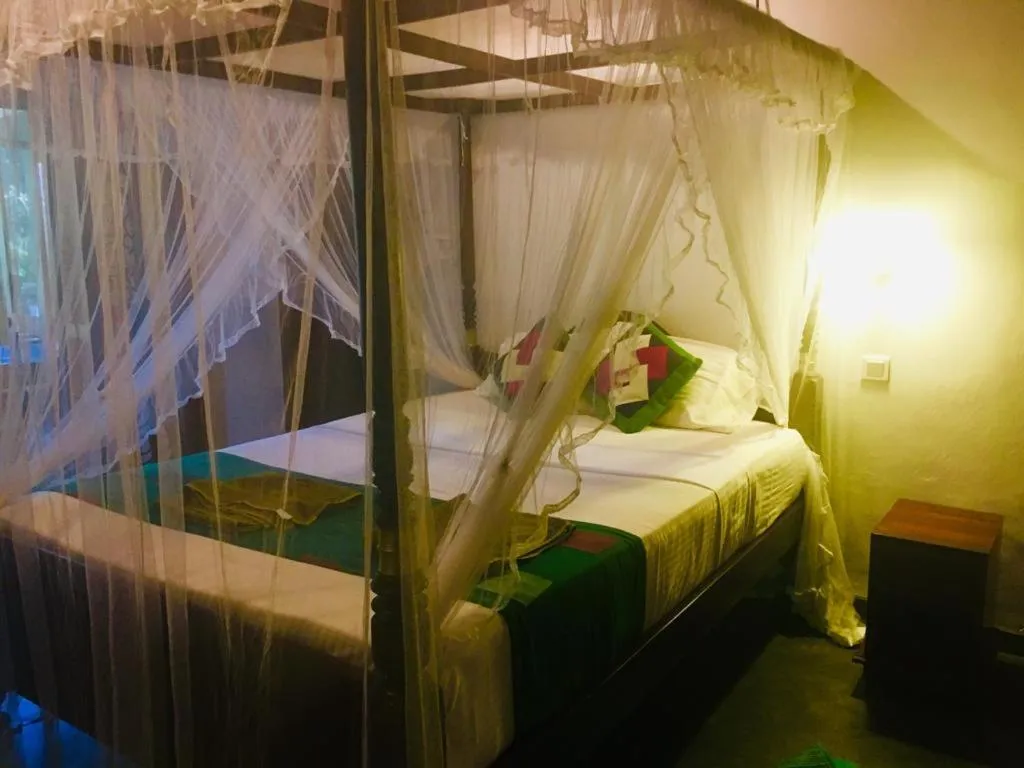 Bed in Goyambokka Guesthouse