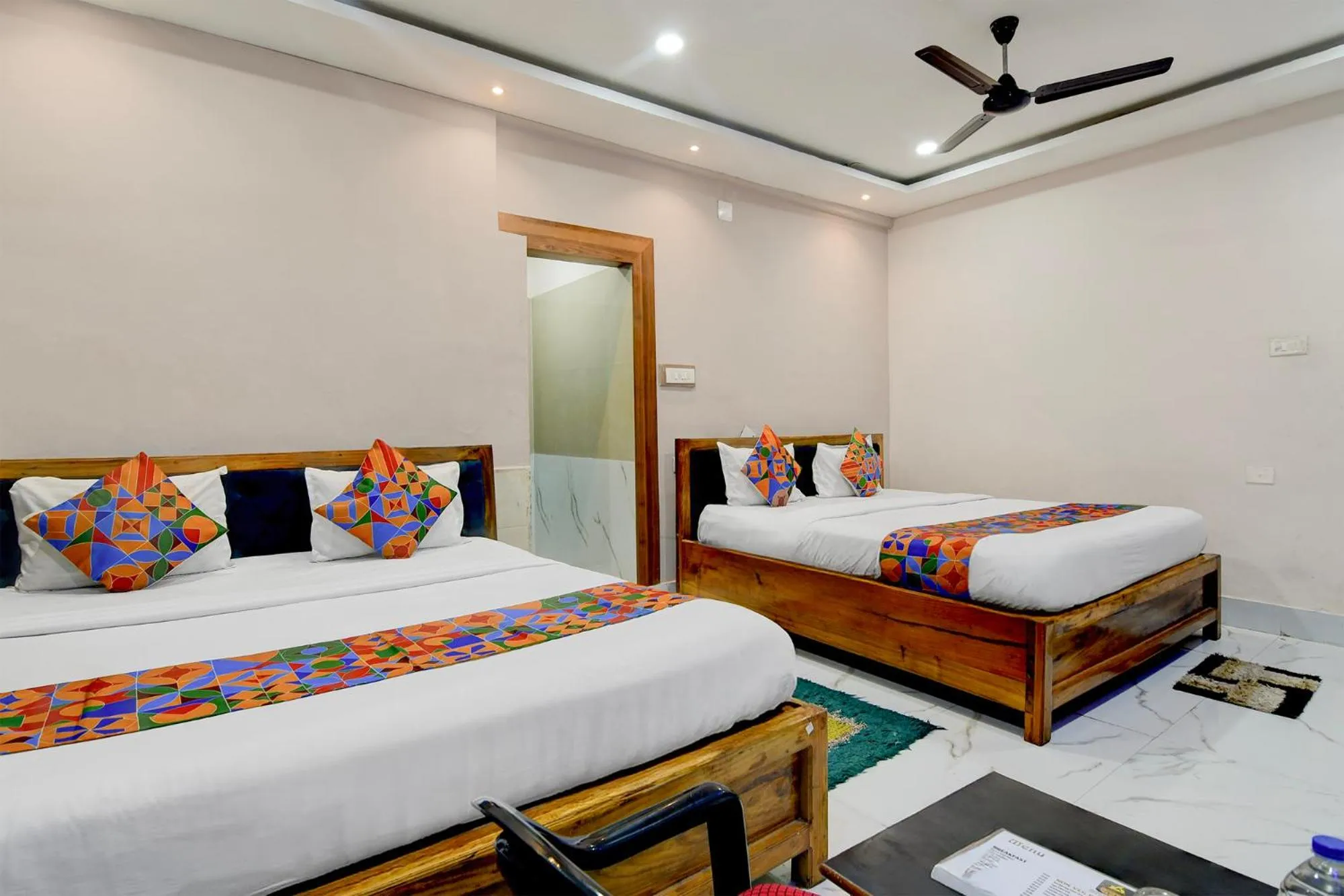 Bed in FabHotel Seven Inn