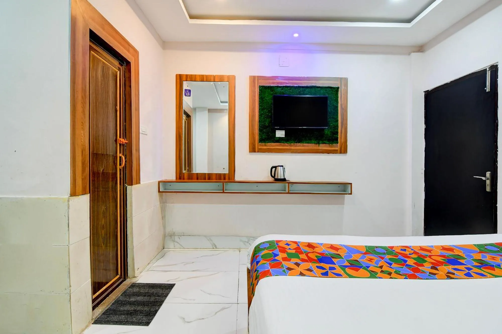 Bed in FabHotel Seven Inn