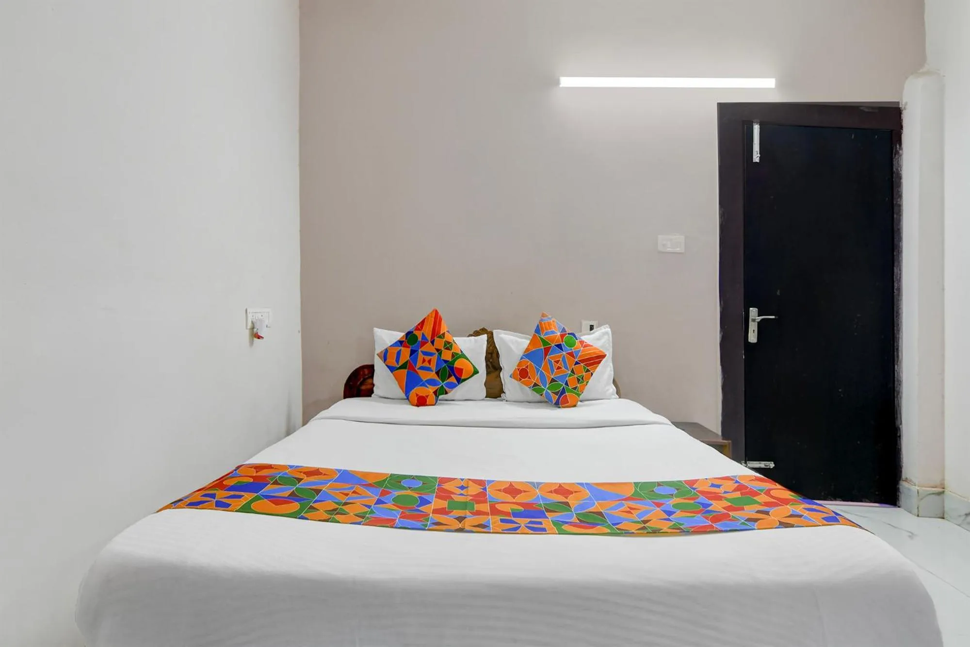 Bed in FabHotel Seven Inn