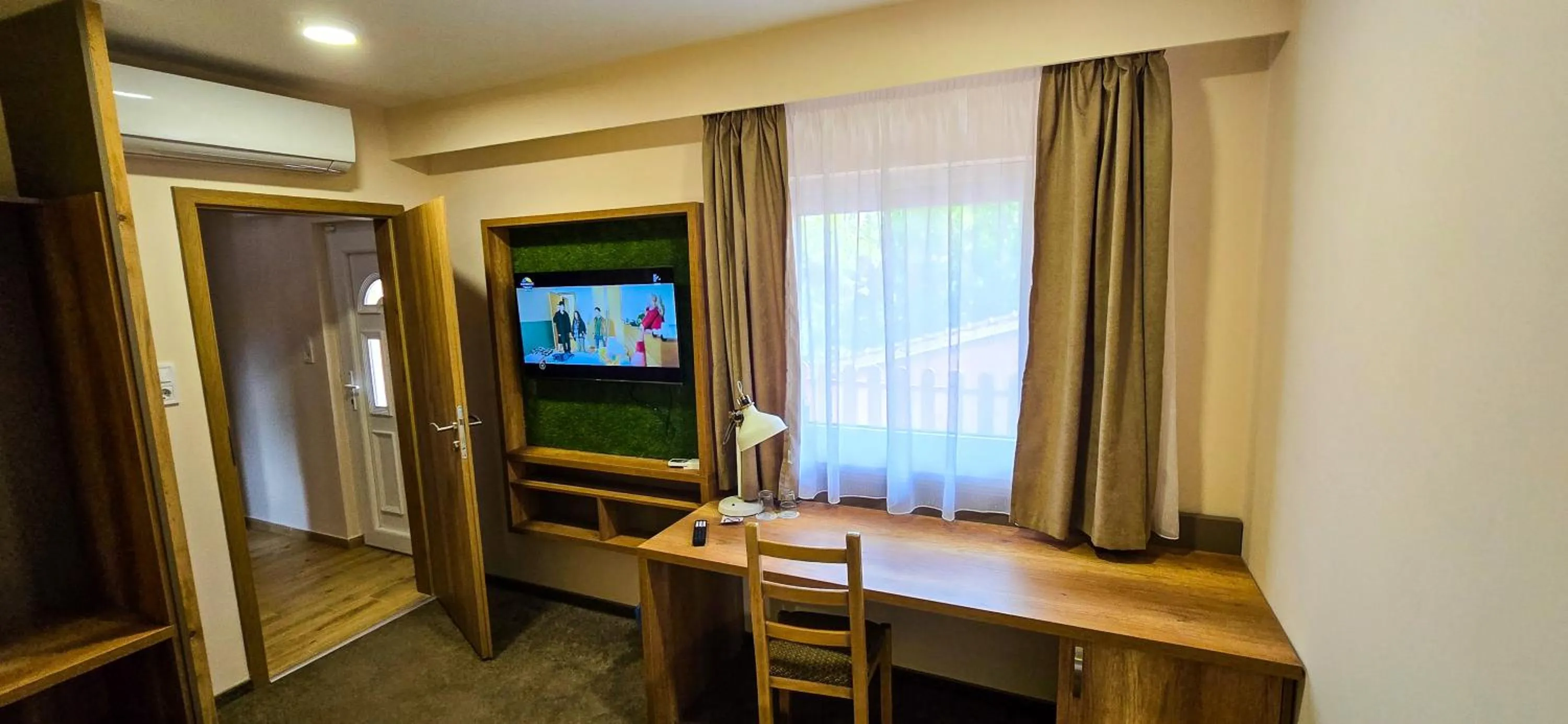 TV and multimedia in Bauer Resort Countryside Retreat