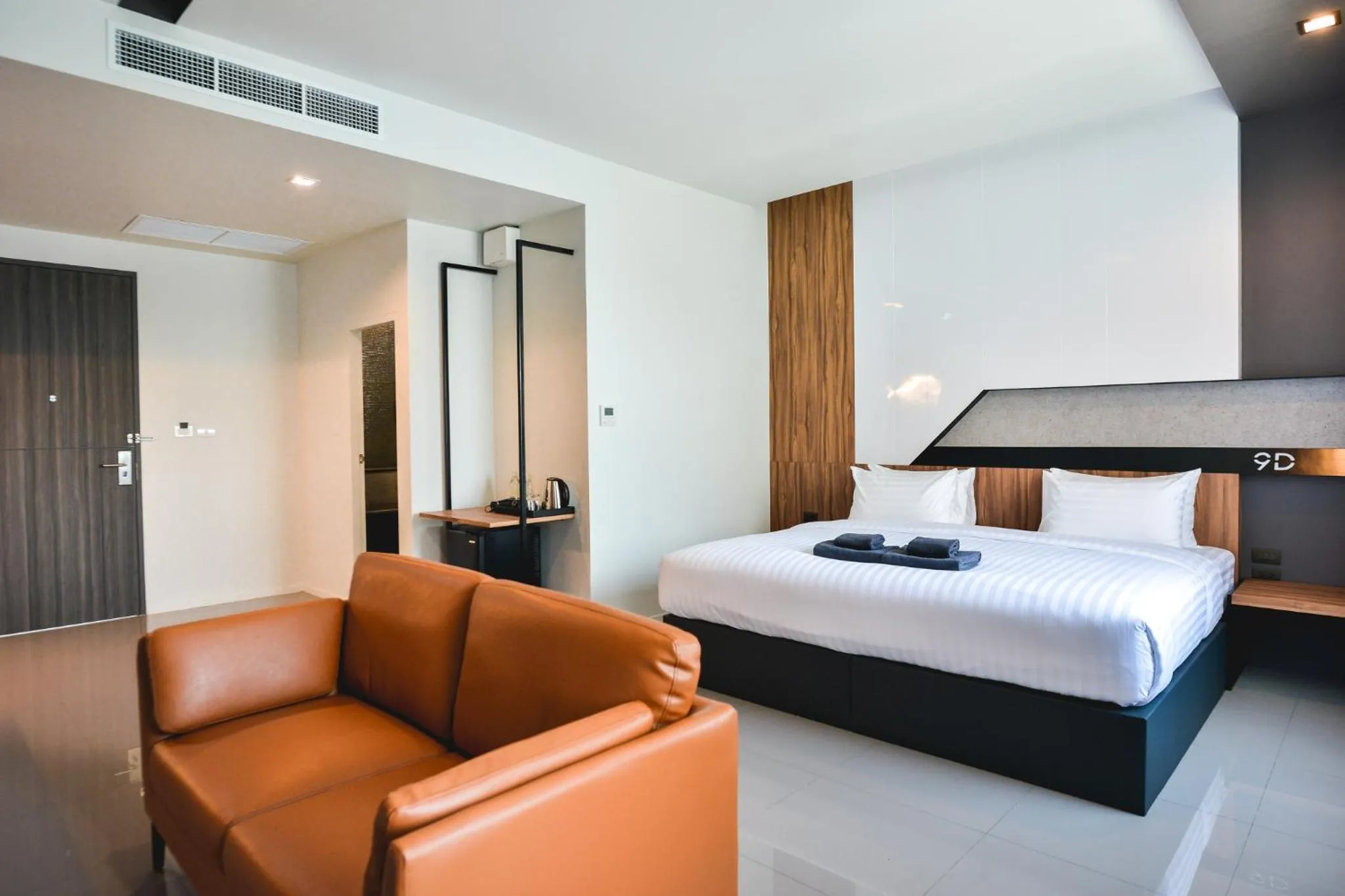 Bed in 9D Sport Hotel