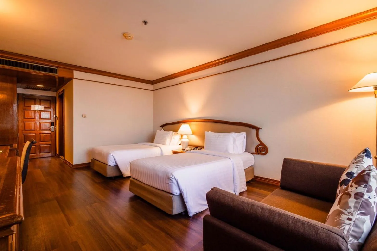 Bed in The Twin Lotus Hotel