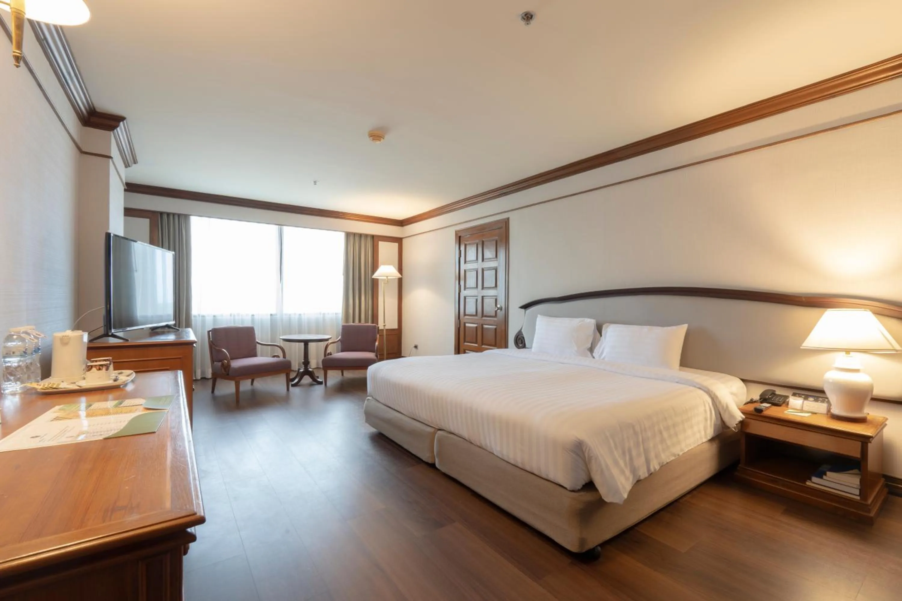 Bed in The Twin Lotus Hotel