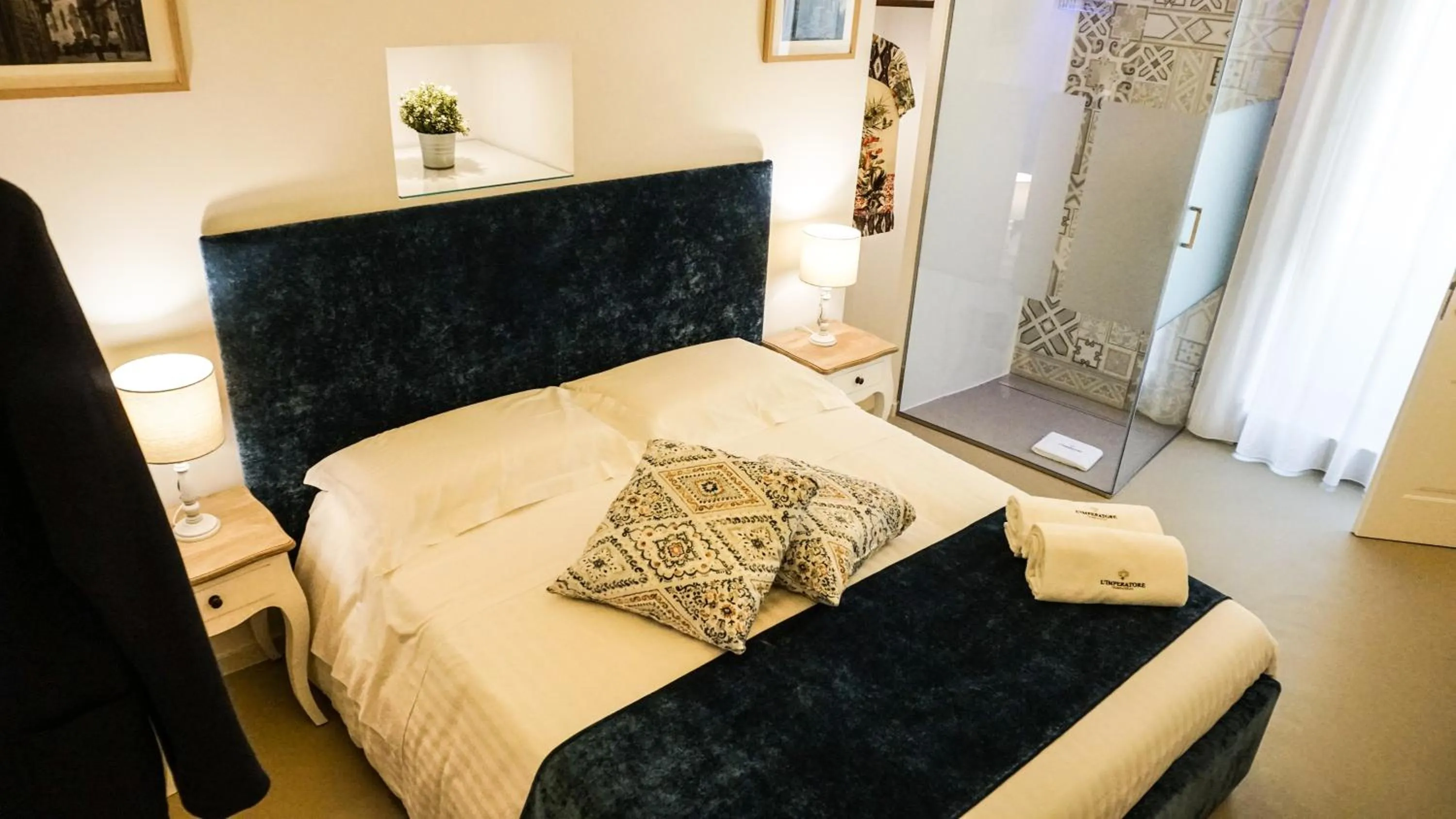 Bed in L'IMPERATORE Relax & Charme