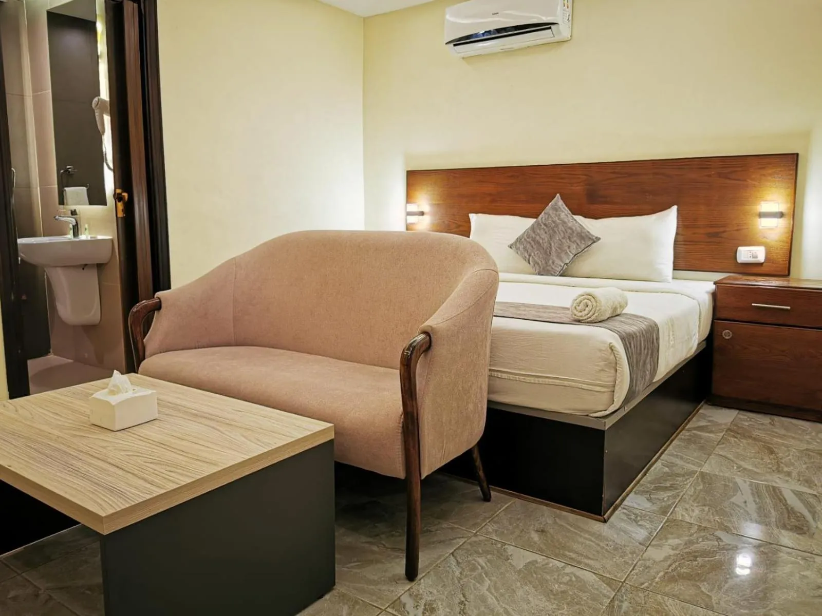 Living room, Bed in TAJ Hotel