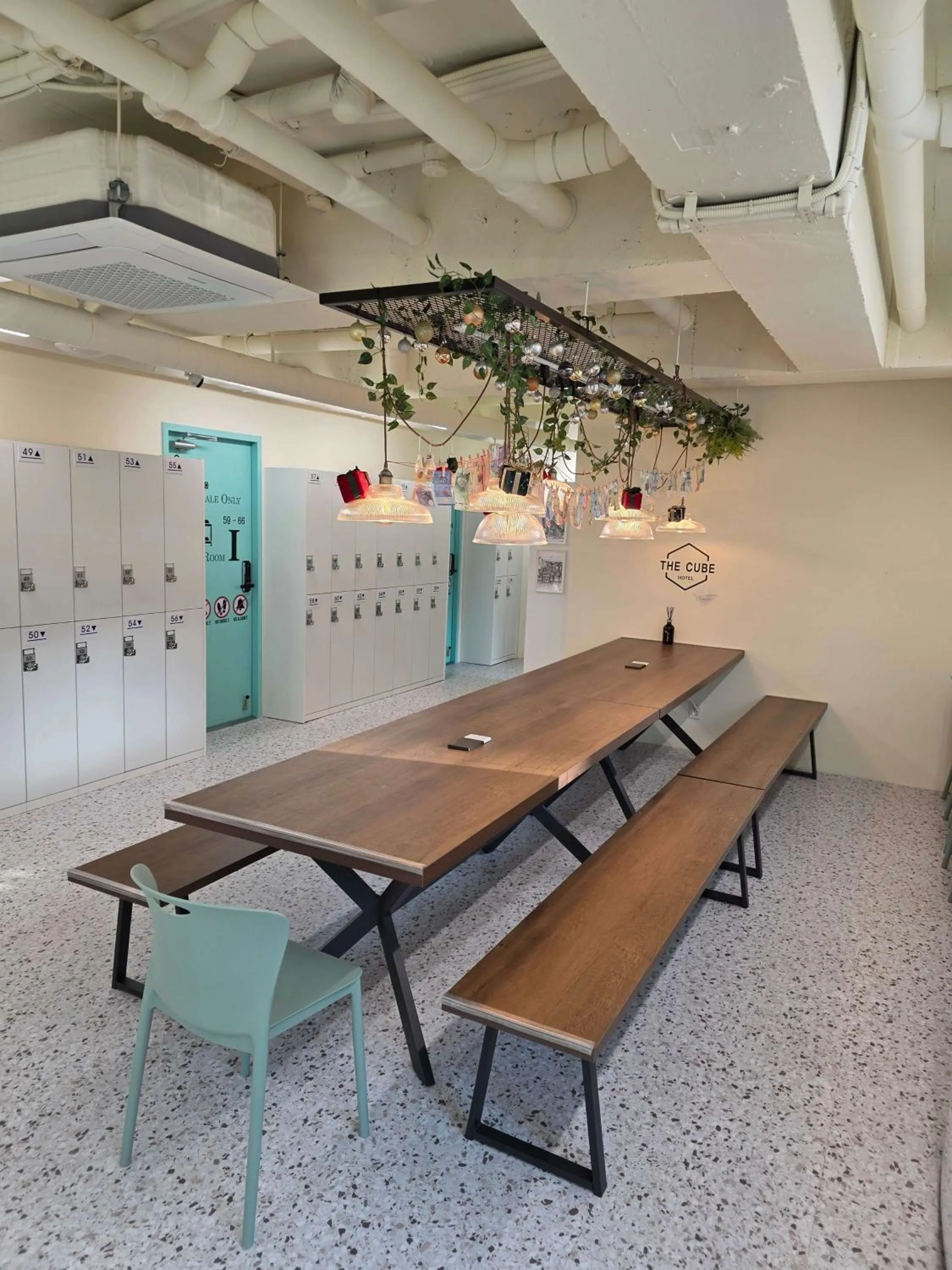 Communal lounge/ TV room in The Cube Hotel