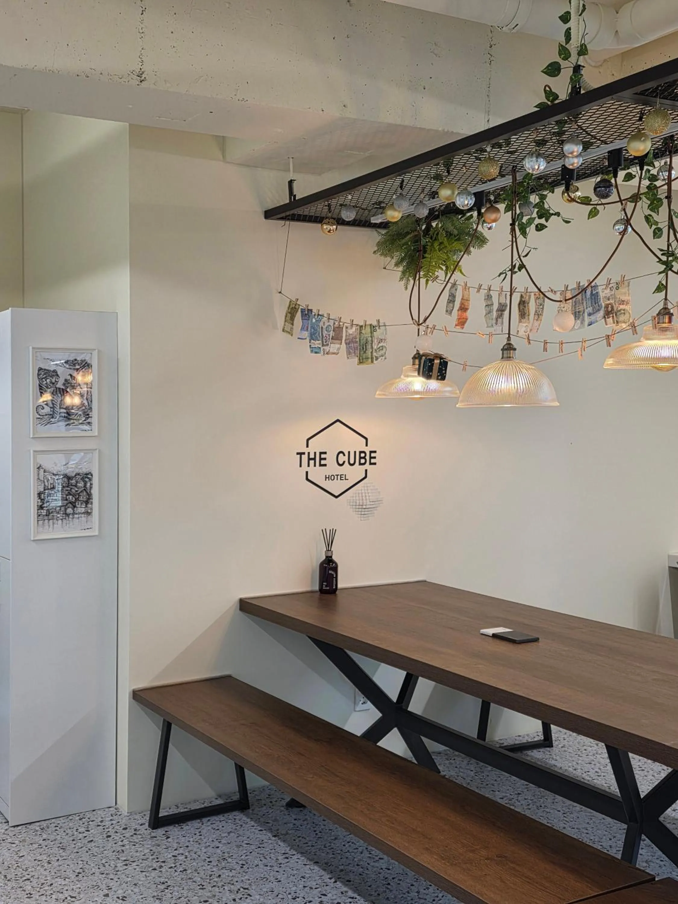 Communal lounge/ TV room in The Cube Hotel